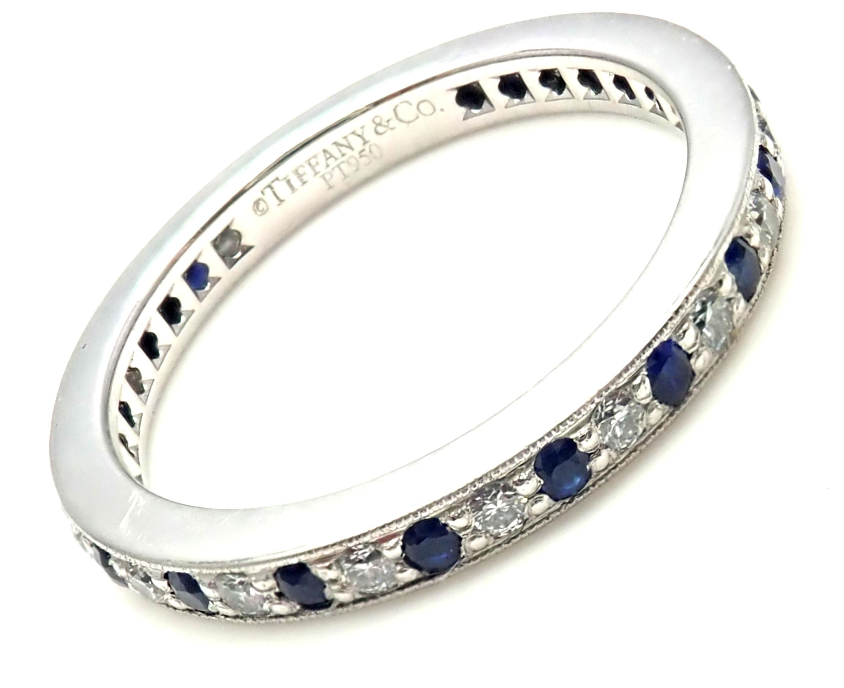 Platinum Diamond And Sapphire Legacy Band Ring by Tiffany & Co.
With Round brilliant cut diamonds VVS1 clarity, E color total weight approx. .20ct
round sapphires total weight approx. .26ct
Measurements: 
Ring Size: 5 1/4
Weight: 3.7 grams
Band