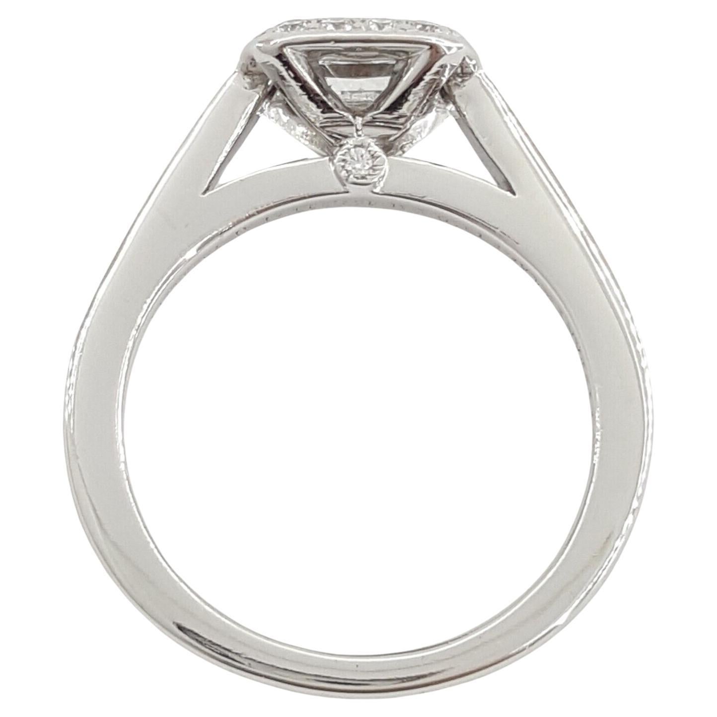 This exquisite engagement ring from Tiffany & Co.'s Platinum Legacy collection is a symbol of luxurious elegance and timeless design. The ring, crafted in platinum, weighs 4.5 grams and is sized at 4, offering a refined and comfortable fit.

The