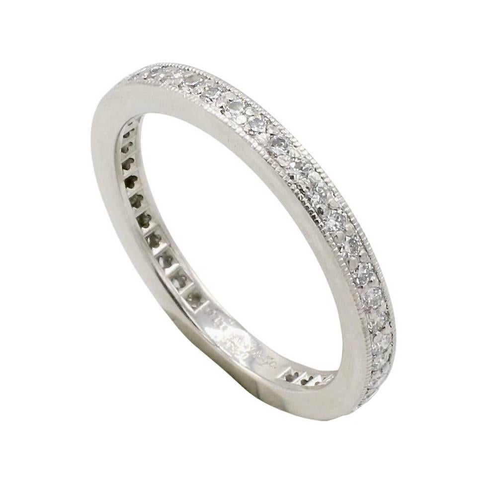 Tiffany & Co Legacy Platinum Pave Diamond Full Eternity 2.2mm Wedding Band Ring
Metal: Platinum
Weight: 4.18 grams
Diamonds: Approx. .40 CTW natural D-F VVS-VS round diamonds
Width: 2.2mm
Size: 7 (US)
Signed: ©Tiffany & Co. PT950
Retail: $4,650 USD
