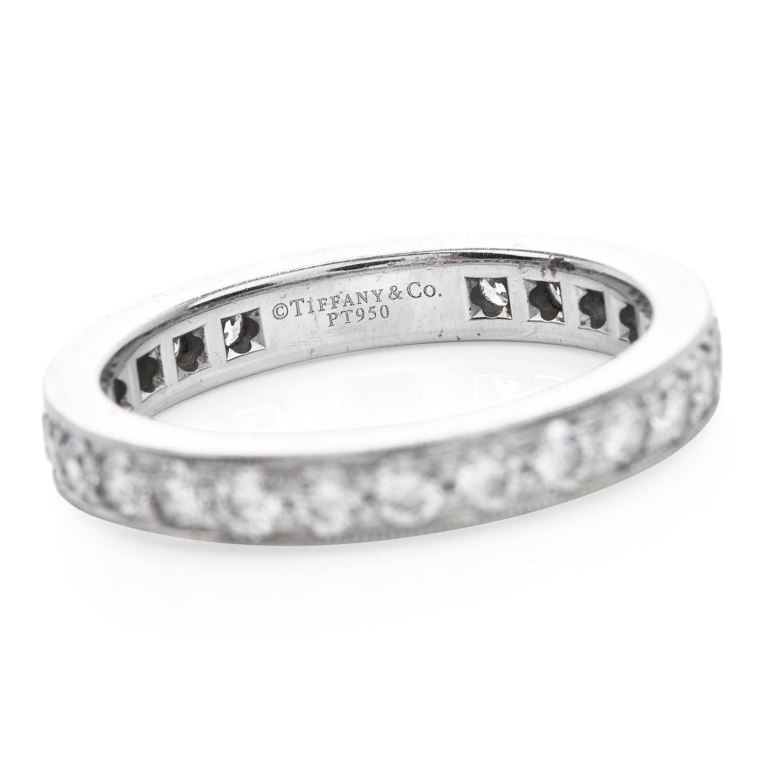 A Refined Elegance is a statement describing this elegant

Tiffany & Co. detailed Round Cut Eternity Band Ring.

26 Vibrant, White Round Cut Diamonds wrap around this band from

end to end. 

A total 1.60-carat weight, F-G  color, VVS  Clarity, the