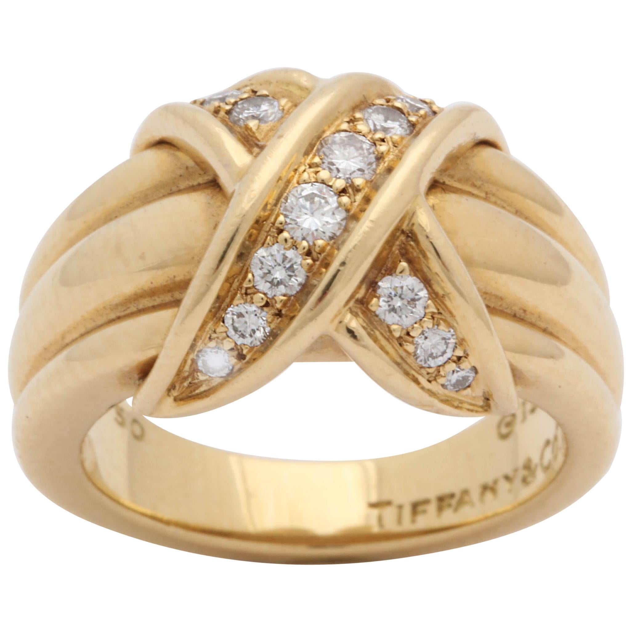 Tiffany 
Co. Letter "X" Design Diamond with Ridged Gold Chic Ring