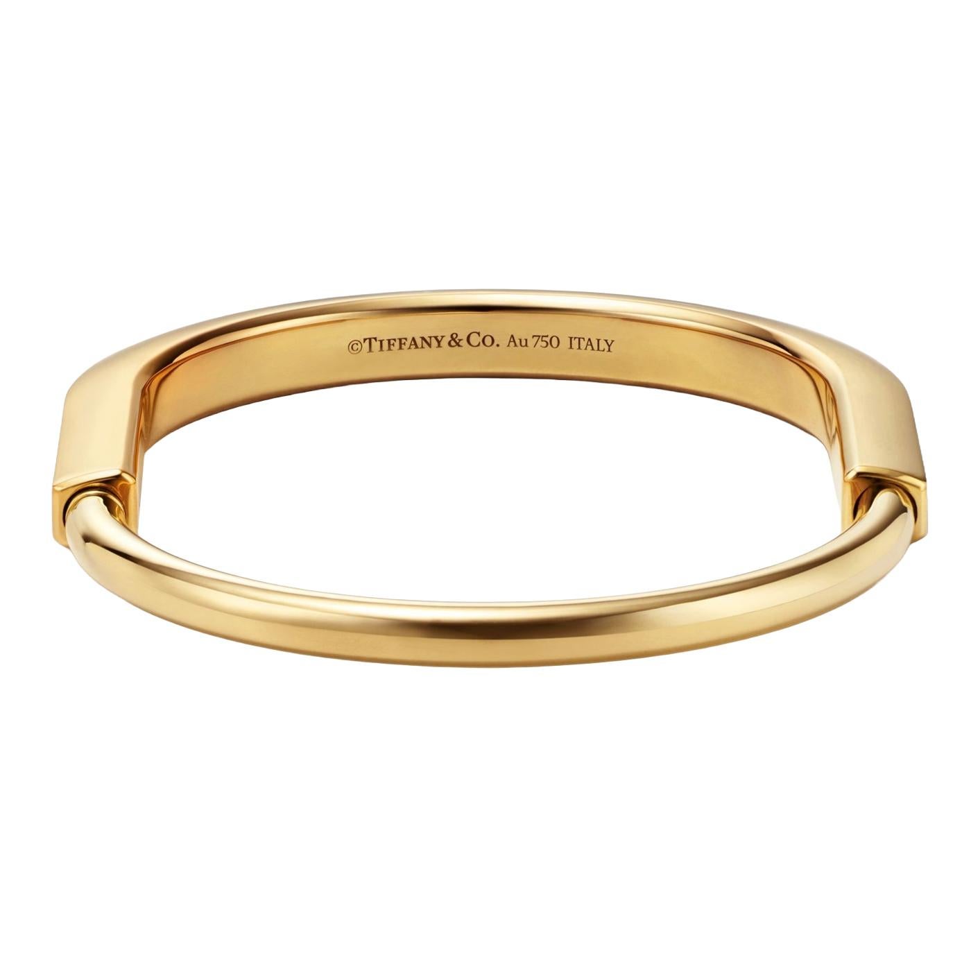 Tiffany & Co Lock Bangle 18k Yellow Gold Medium Size Bracelet In Excellent Condition In Aventura, FL