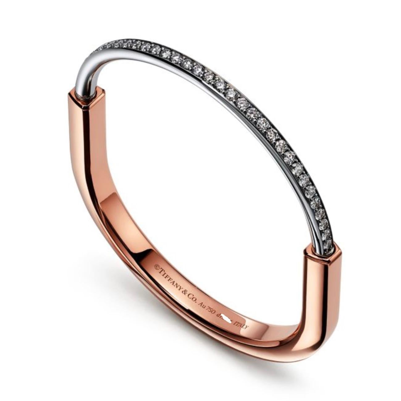  Designer: Tiffany & Co.
Collection: Tiffany Lock
Model Number: 70158329
Style: Bangle Bracelet
Metal: Rose and White Gold
Metal Purity: 18K
Total Carat Weight: 1.08 ct
Size: Small (fits wrists up to 5.75 in