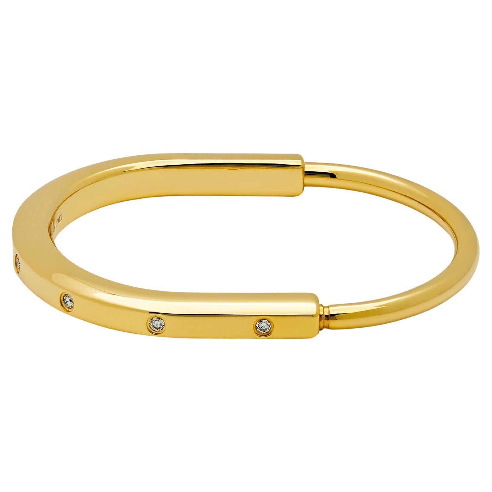 Tiffany & Co. Lock Bangle in Yellow Gold with Diamond Accents For Sale