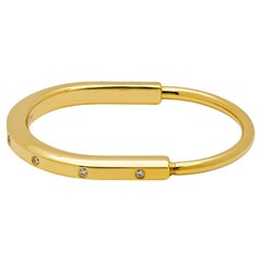 Tiffany & Co. Lock Bangle in Yellow Gold with Diamond Accents