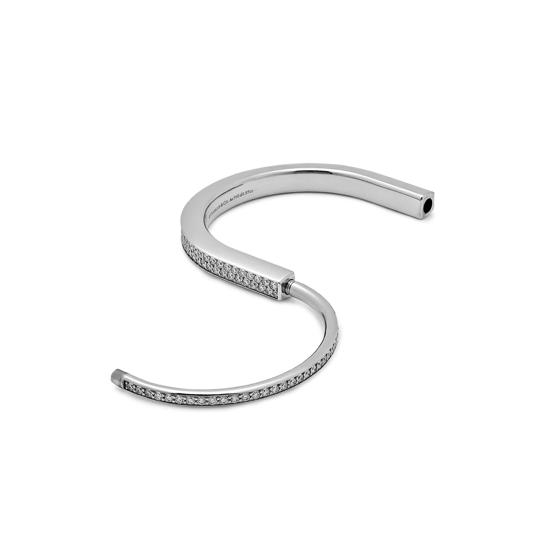 Designed to be worn by all genders, The Tiffany & Co Lock Bangle is a bold visual statement about the personal bonds. 

Crafted from 18-karat white gold, the Tiffany Lock bangle features an innovative clasp a nod to Tiffany's history. Hand-set