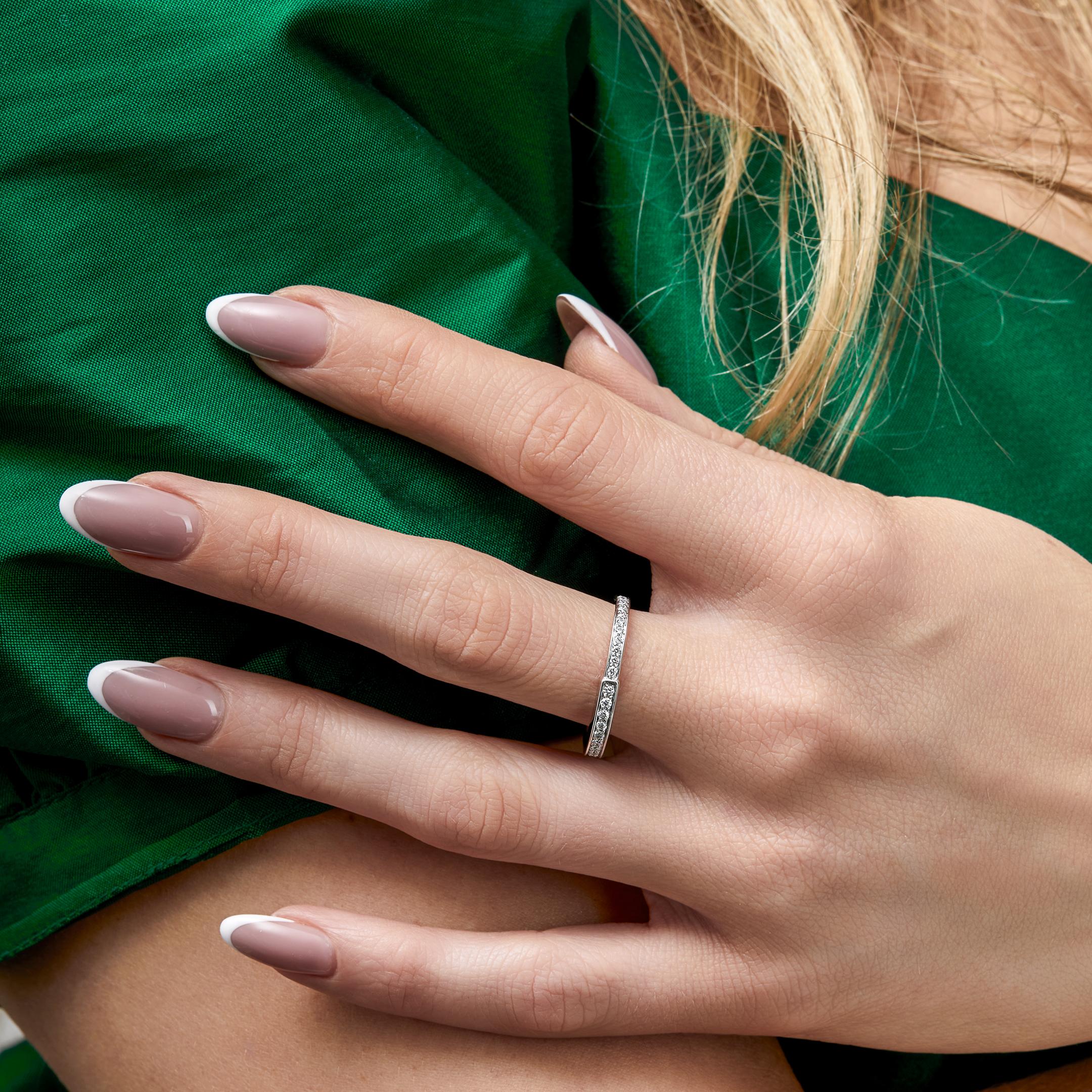 The Tiffany & Co. Lock ring is a bold symbol of unity and diversity, celebrating personal connections that shape us. Crafted in 18k white gold with round brilliant, this ring is a stylish choice whether worn alone or as part of your everyday ring