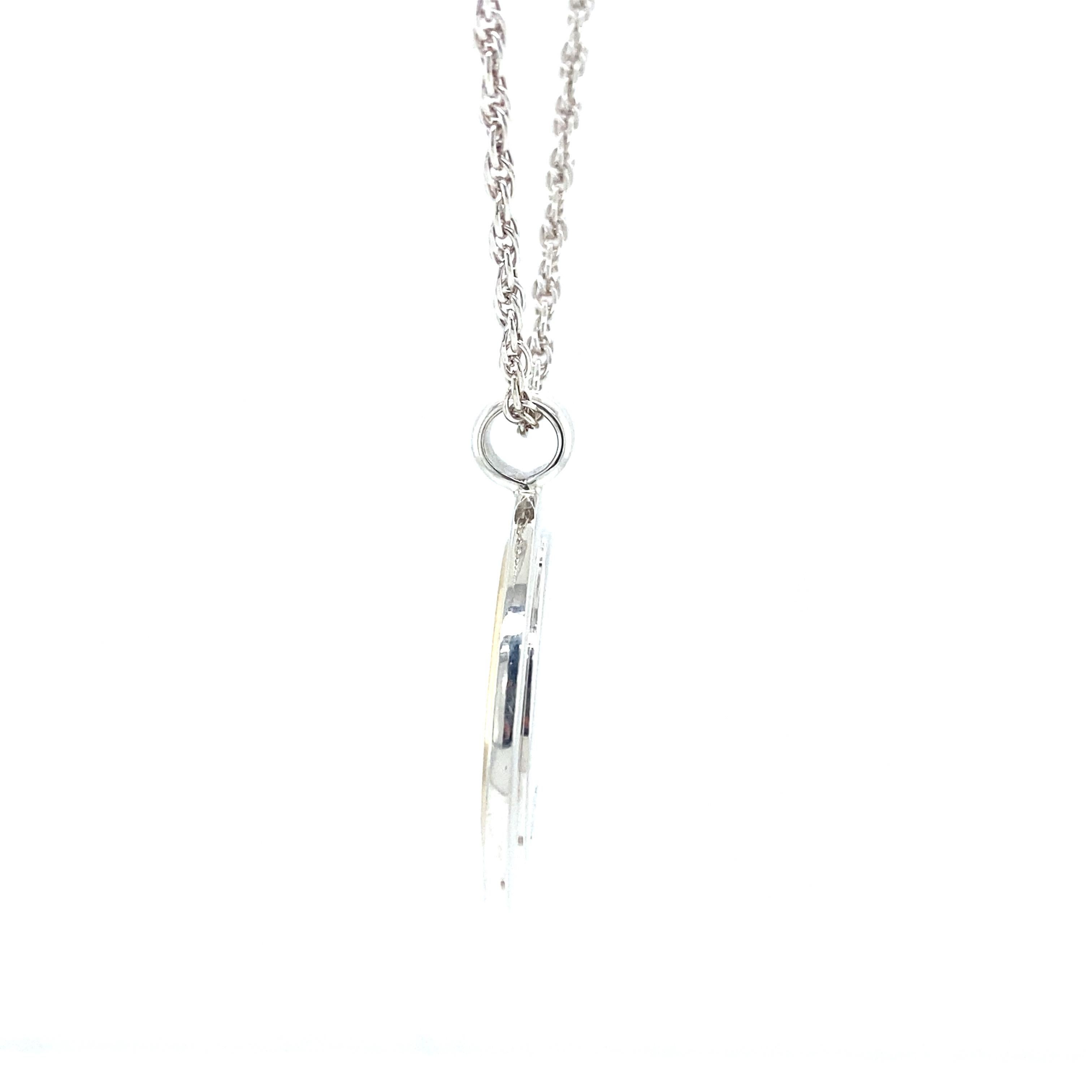 Tiffany & Co Logo-Anhänger und Halskette aus 18 Karat Gelbgold und Silber im Angebot 1