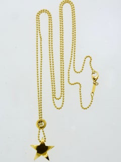 Tiffany & Co. Long 18K Gold Star Vintage Necklace.