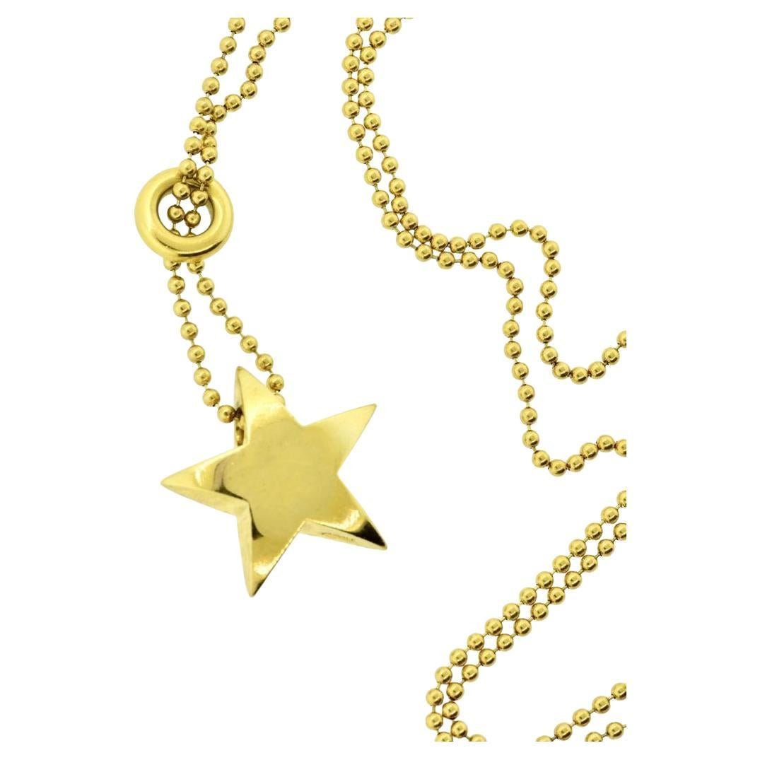 Tiffany
Co. Long 18K Gold Star Vintage Necklace.