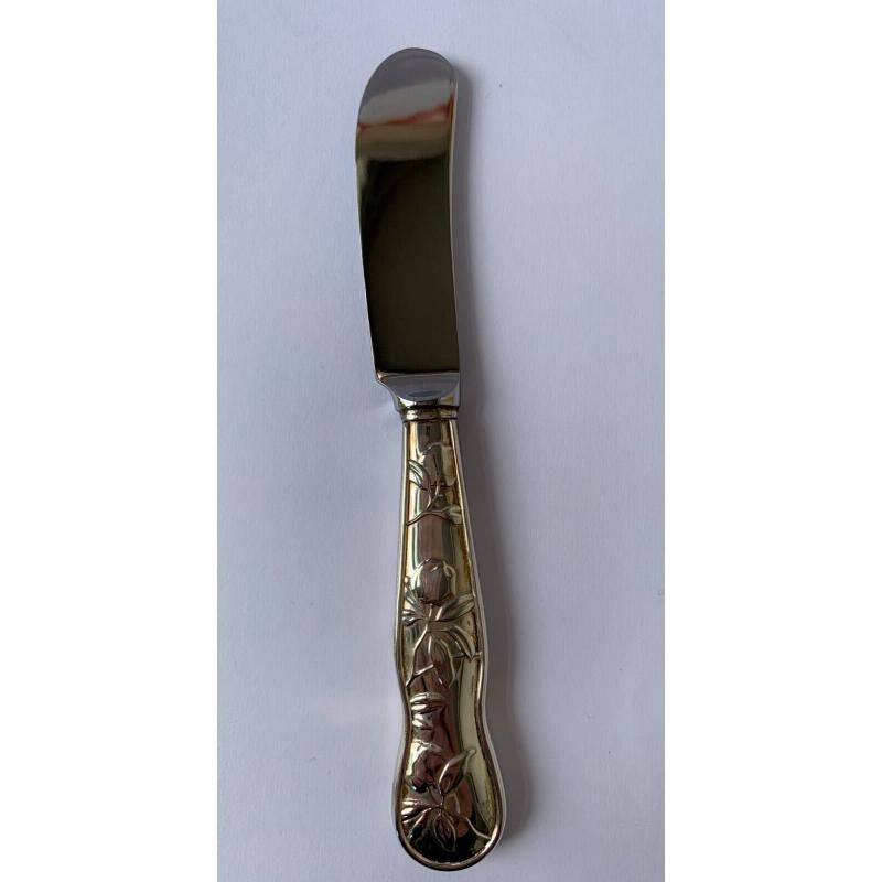 In good vintage condition, the cheese knife has a lovely pattern of grapes on a vine. The butter knife is decorated with leaves and buds.They are sold in their original blue velvet and satin-lined box.

Hallmarked: Made by Tiffany & Co Ltd in London