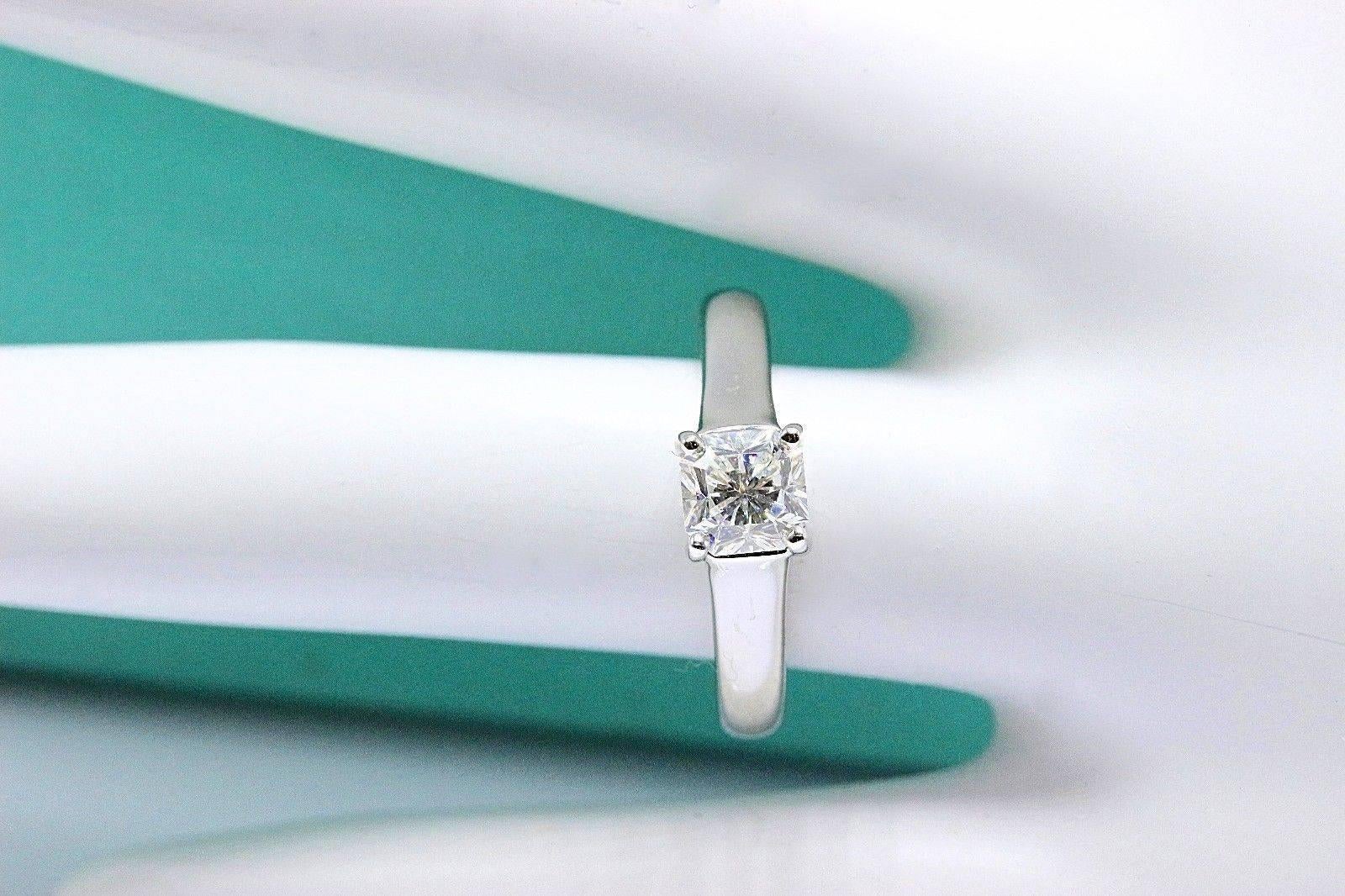 Modern Tiffany & Co. Lucida 0.63 Carat G VS1 Diamond Platinum Engagement Ring Papers