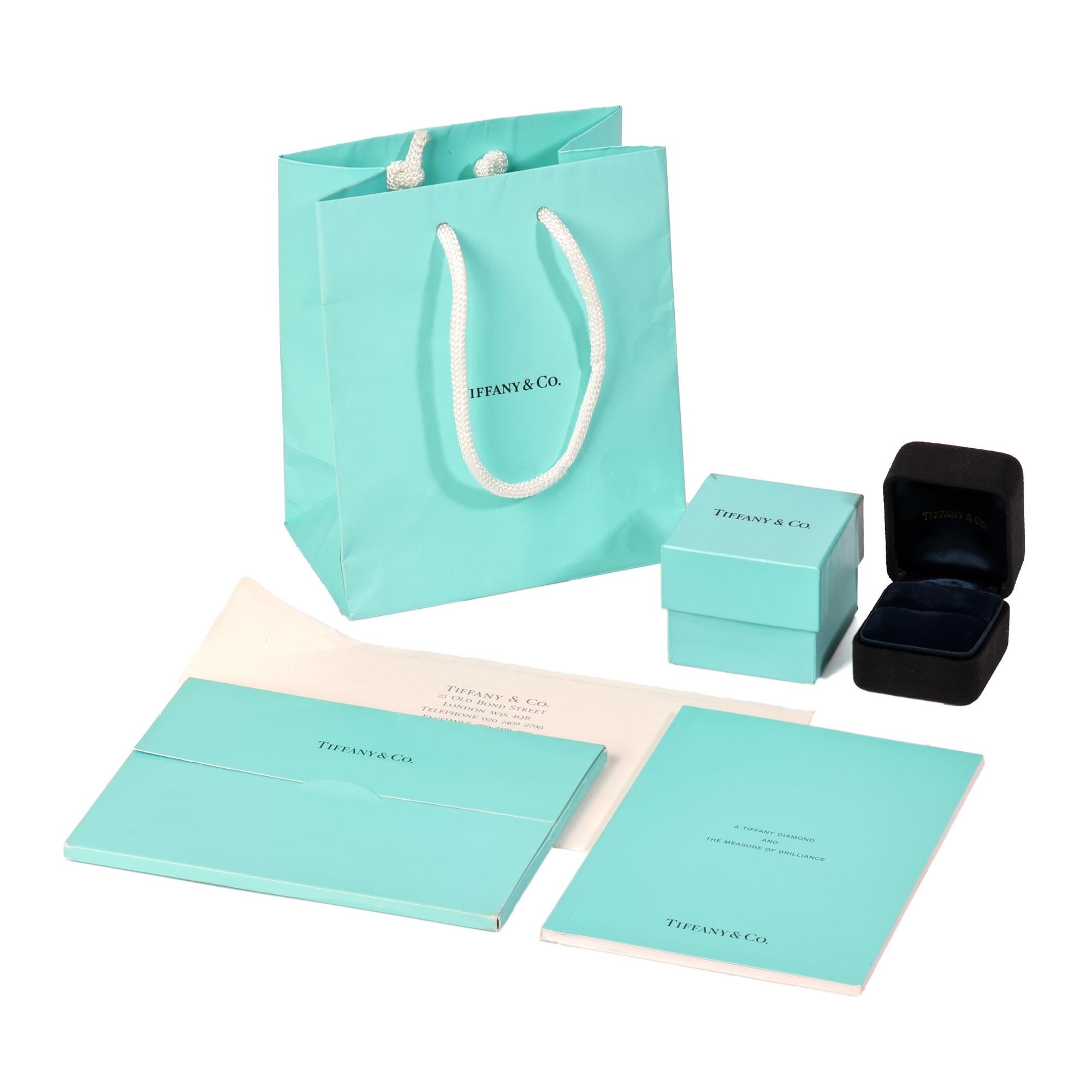 ITEM CONDITION	Excellent
MANUFACTURER	Tiffany & Co.
MODEL	Lucida
GENDER	Women's
ACCOMPANIED BY	Tiffany & Co Box and Certificate
UK RING SIZE	J 1/2
EU RING SIZE	49
US RING SIZE	5
BAND WIDTH	2.5mm
TOTAL WEIGHT	4.38g
PRIMARY STONE QUANTITY	1
PRIMARY