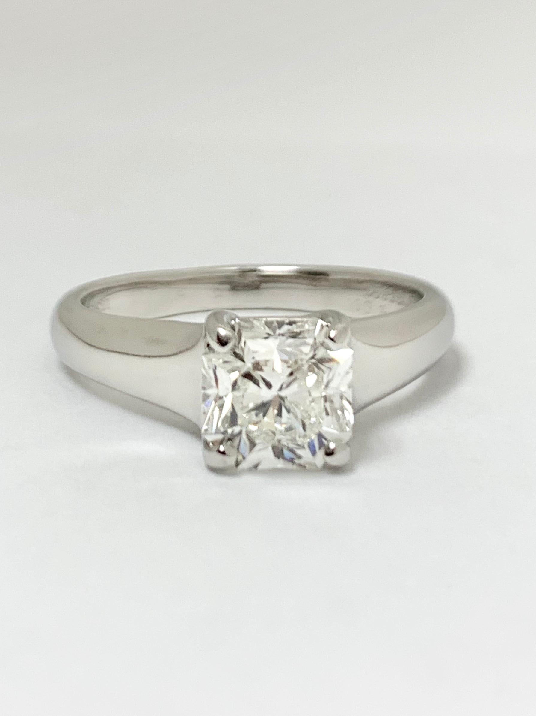 Tiffany & Co. Lucida Diamond engagement ring with 1.39 ct center , H color , VVS2 clarity. Finely crafted in Platinum. Accompanied by GIA report and Tiffany report. 
Style: Lucida Solitaire 
Metal: Platinum PT950 
Total Carat Weight: 1.39 cts