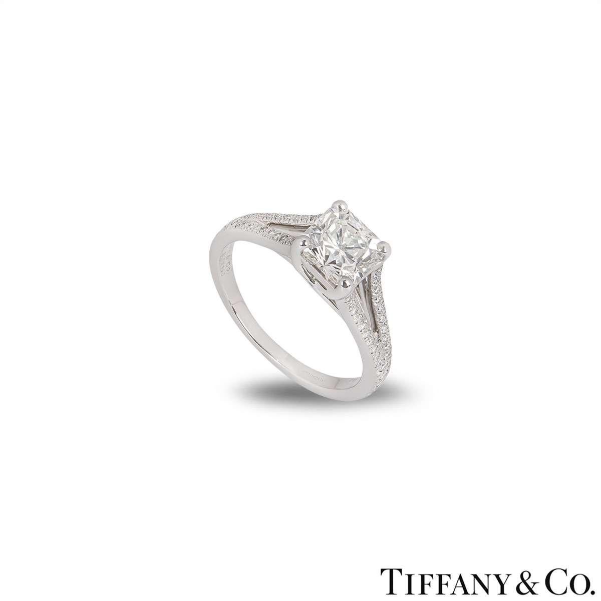 A stunning platinum diamond ring from the Lucida collection by Tiffany & Co. The ring is set to the centre with a 1.24ct Lucida cut diamond, I colour and VVS2 clarity. The ring has split shoulders, pave set with round brilliant cut diamonds
