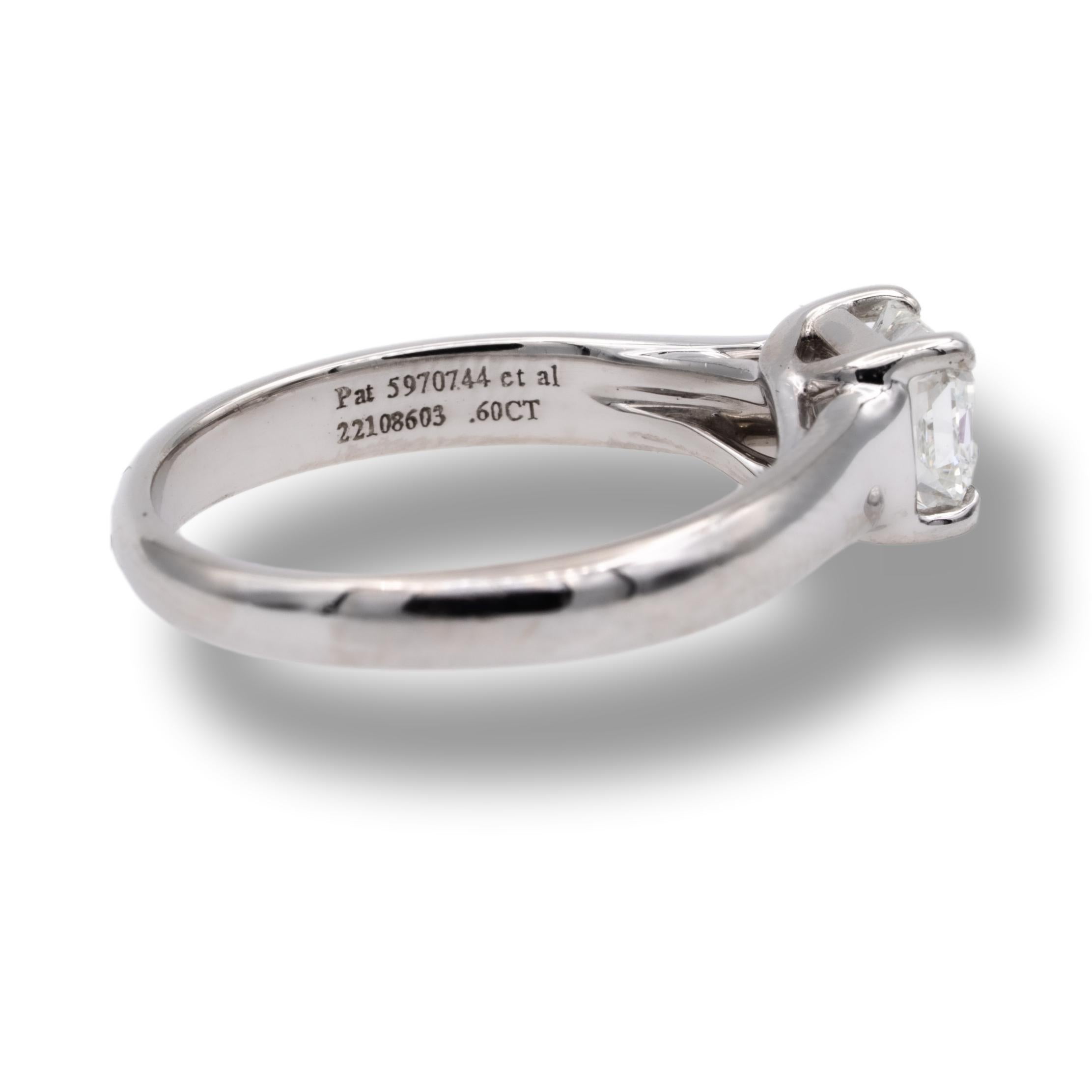 Tiffany & Co Lucida engagement ring with 0.60 carat center H color VVS2 clarity finely crafted in Platinum.  This ring would retail today at $6,200 based on Tiffany True cut pricing

Brand Tiffany & Co.
Hallmark: Tiffany & Co © 1999 Lucida, PT950