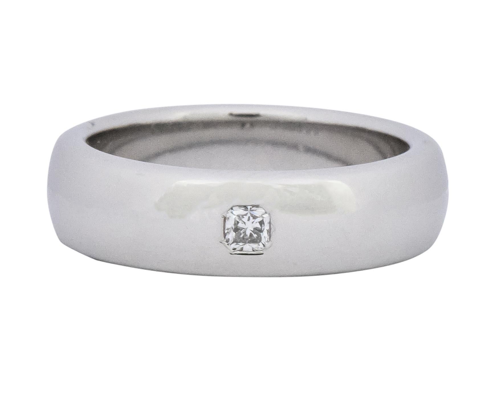 Wide band centering a Lucida cut diamond weighing approximately 0.20 carat, G color and VS clarity

Flush set in a high polished platinum band

Fully signed Tiffany & Co. Lucida, Pat. 5970744 et al, and stamped PT 950

Ring Size: 8 (complimentary