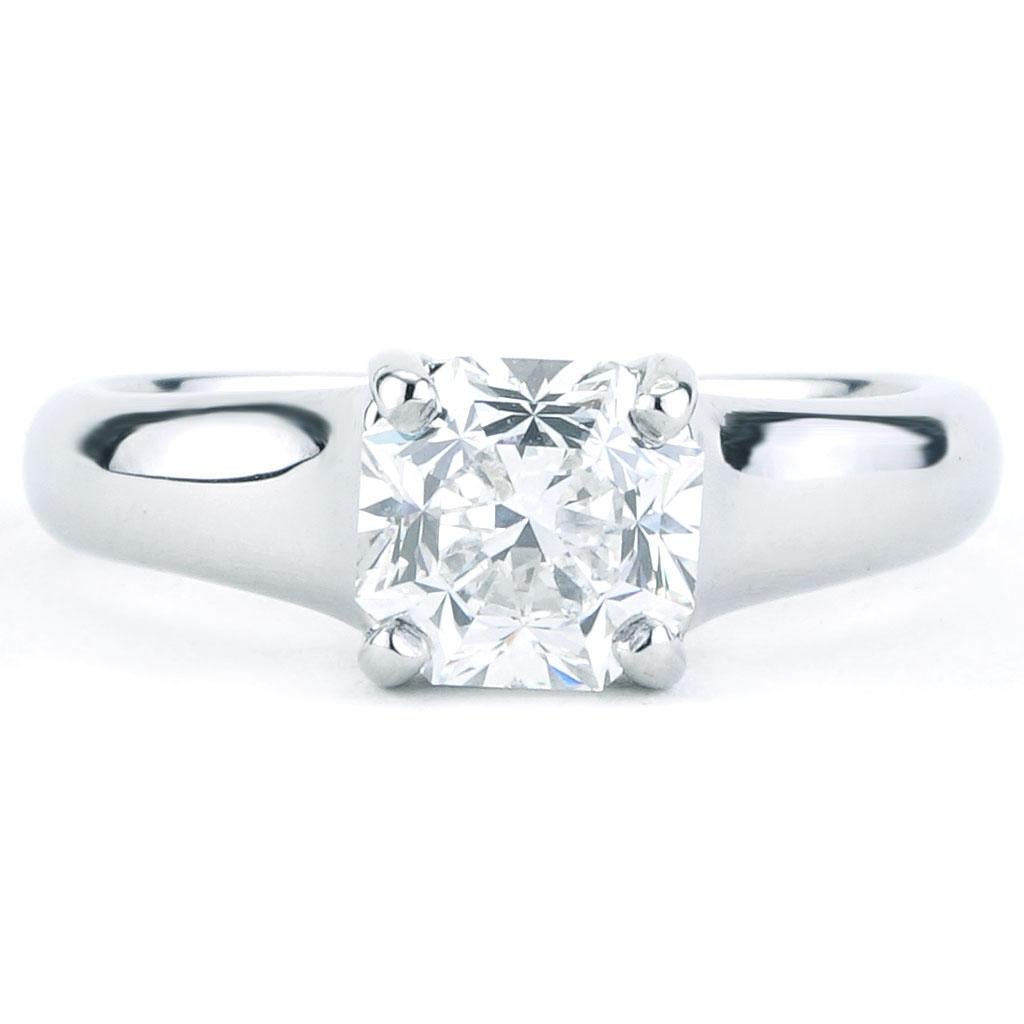Tiffany & Co. Lucida Collection solitaire engagement ring. The ring is a size 4.75 (US), made of platinum, and weighs 3.8 DWT (approx. 5.91 grams). It also has one GIA certified radiant F-color, VS2-clarity diamond weighing 1.30 CT.