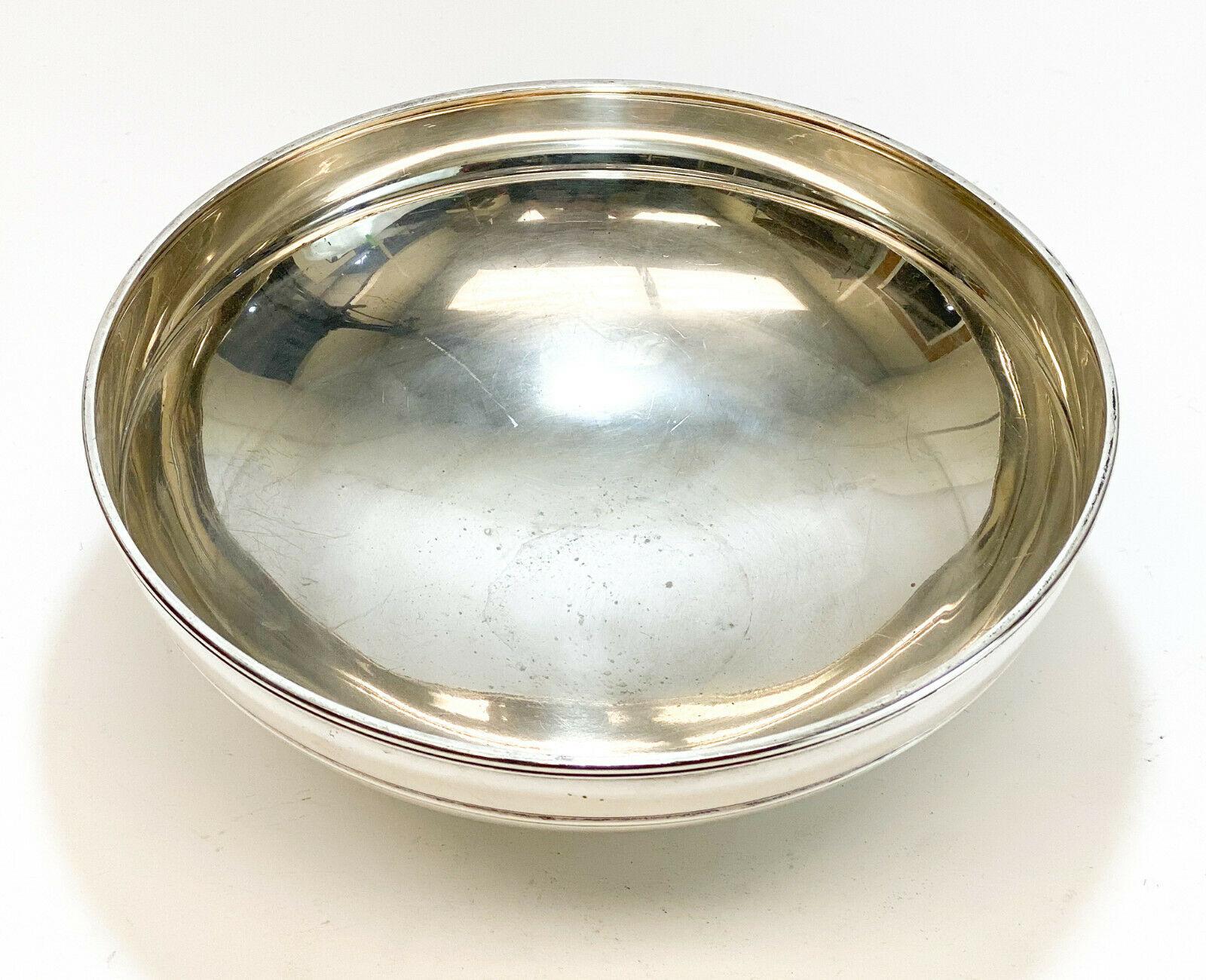 Tiffany & Co. Makers Sterling Silver Footed bowl #20617, John C Moore II

Circular bands to the rim and to the center of the body. Tiffany & Co. Makers sterling silver marks to the underside. 

Additional Information:
Brand: Tiffany & Co.