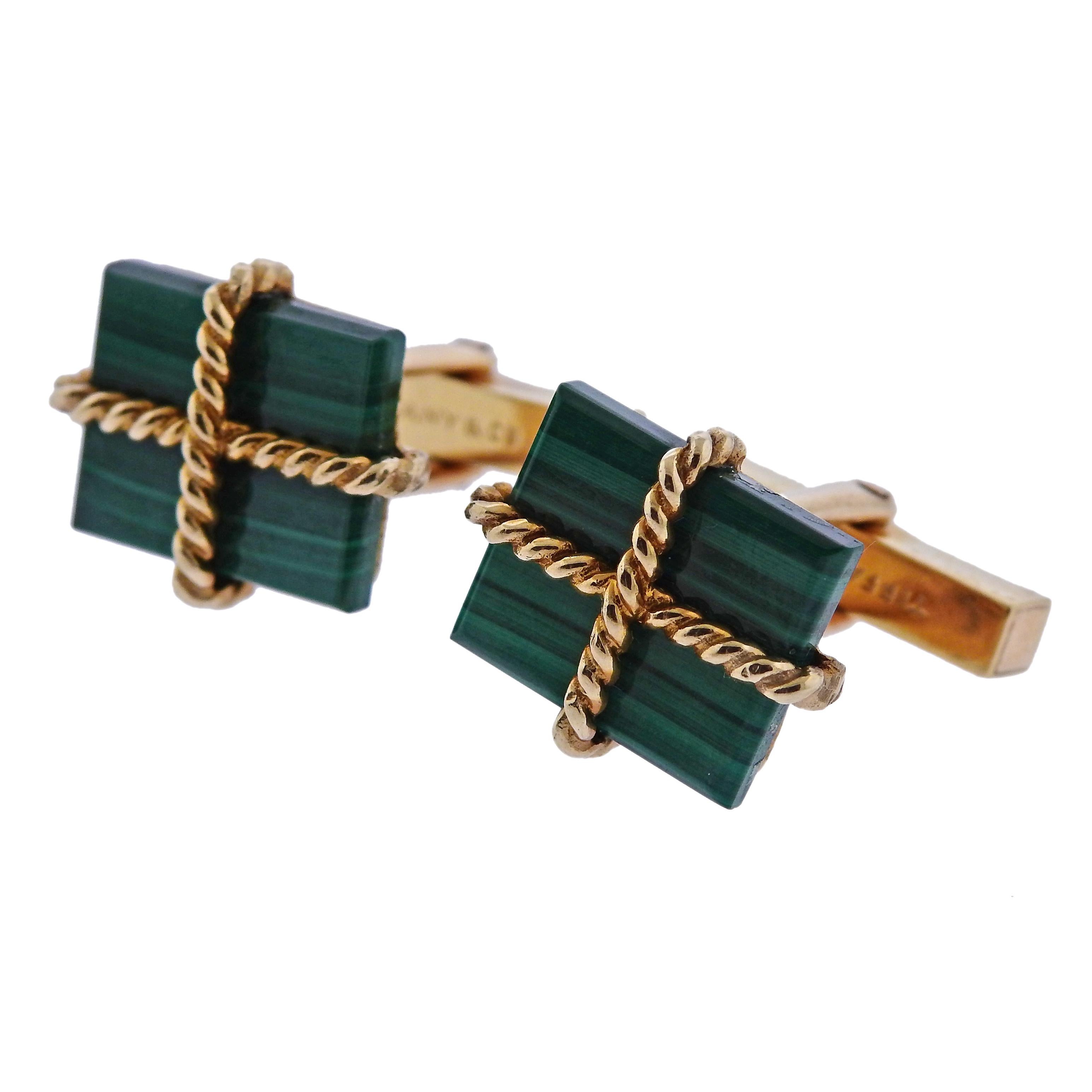 Pair of 14k gold Tiffany & Co cufflinks, set with malachite. Cufflink top measures 18mm x 15mm, weigh 14.5 grams. Marked: Tiffany & Co, 14k.