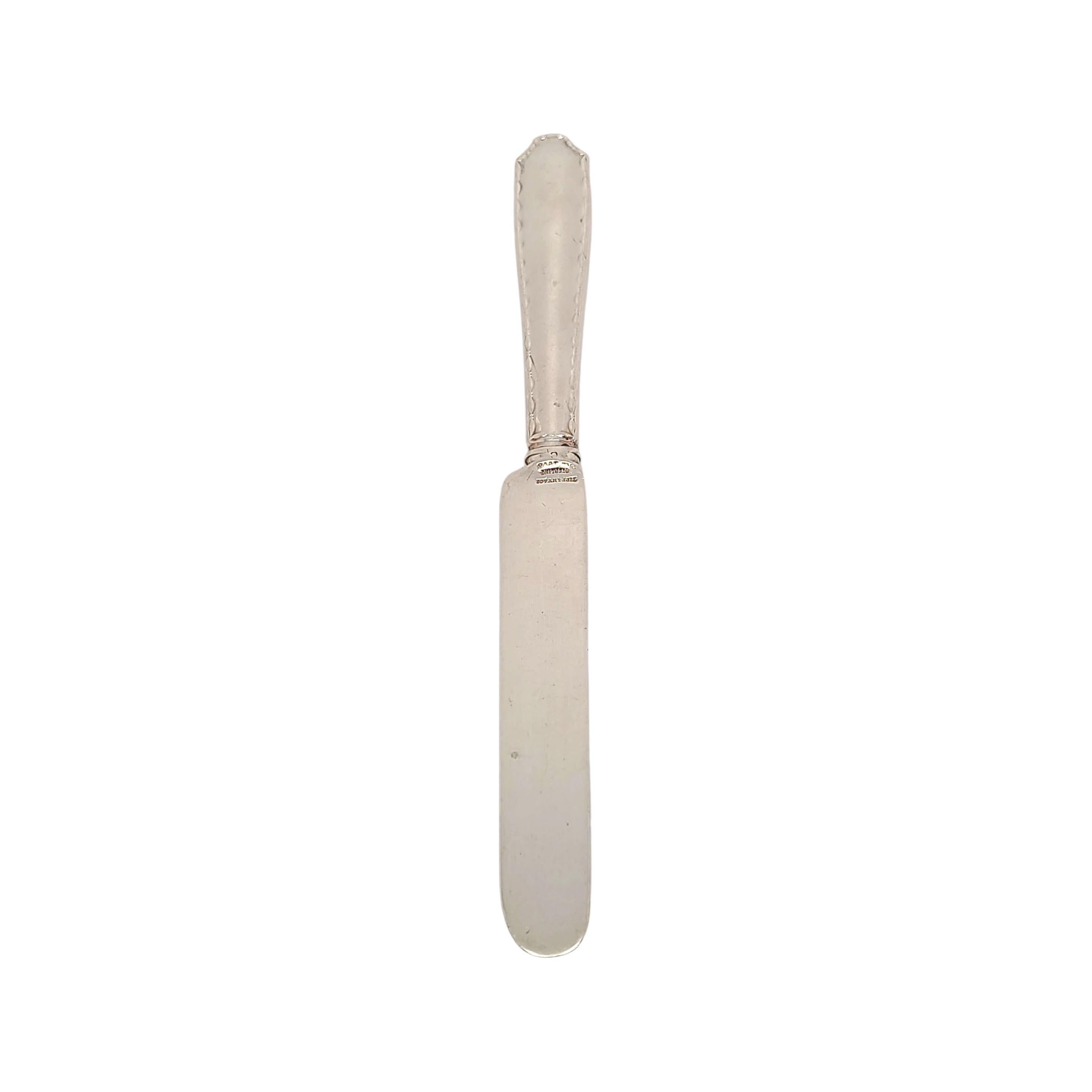Tiffany & Co sterling silver dessert/tea knife in the Marquise pattern.

Marquise is simple and elegant pattern, designed by Paulding Farnham in 1902. Hallmarks date this piece to manufacture under the directorship of Charles T. Cook, 1902-07. Does