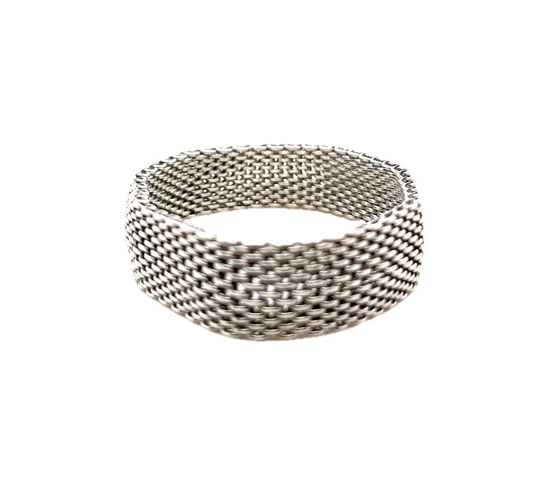 A Tiffany & Co Mesh Weave Flexible Somerset Bracelet in Sterling Silver.

Metal: 925 Sterling Silver
Carat: N/A
Colour: N/A
Clarity: N/A
Cut: N/A
Weight: 58.0 grams
Engravings/Markings: Signed TIFFANY & CO 925

Size/Measurement: 90mm