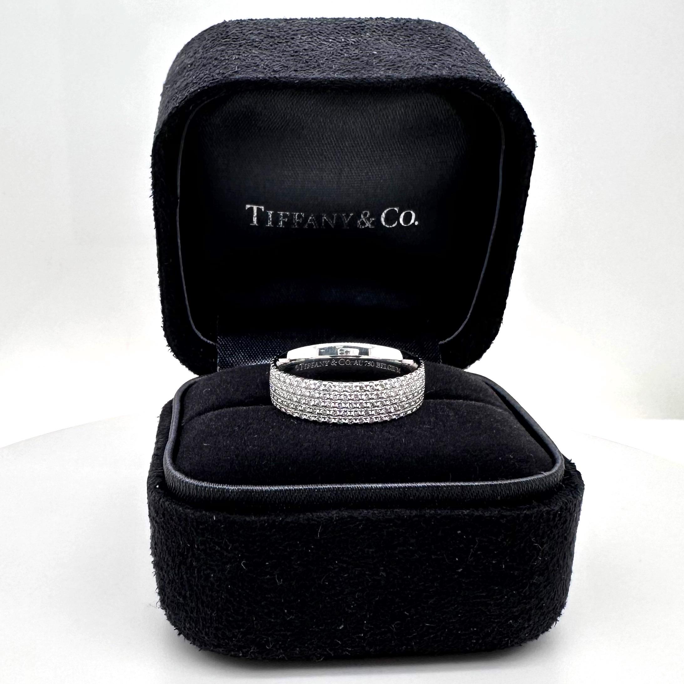 Tiffany & Co. Metro Five-Row Diamond Band Ring
Style:  Band
Ref. number:  60134310
Metal:  18kt White Gold
Size / Measurements:  6 
TCW:  0.90 tcw
Main Diamond:  Approximately 245 Round Brilliant Diamonds  5 Row - Full Circle
Hallmark:  ©TIFFANY&CO.