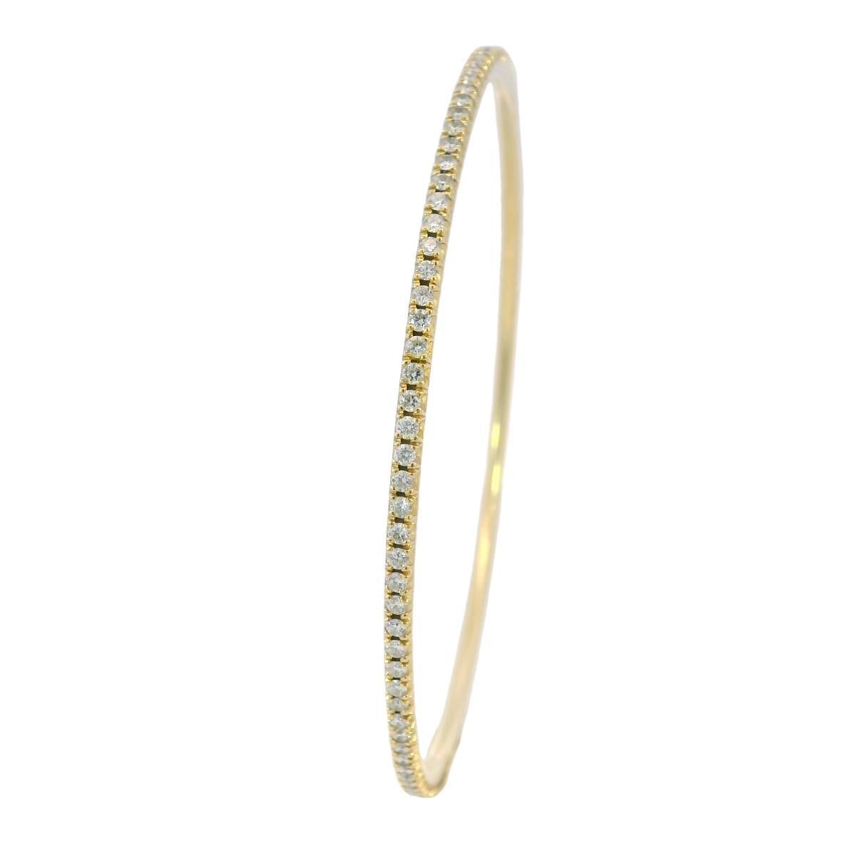 Tiffany & Co. Bracelet Metro en or jaune 18 carats de taille moyenne avec boîte et papiers

Ce bracelet bangle de Tiffany & Co. reflète une élégance moderne et épurée en or jaune 18 carats. Son design épuré et sa forme raffinée lui confèrent une