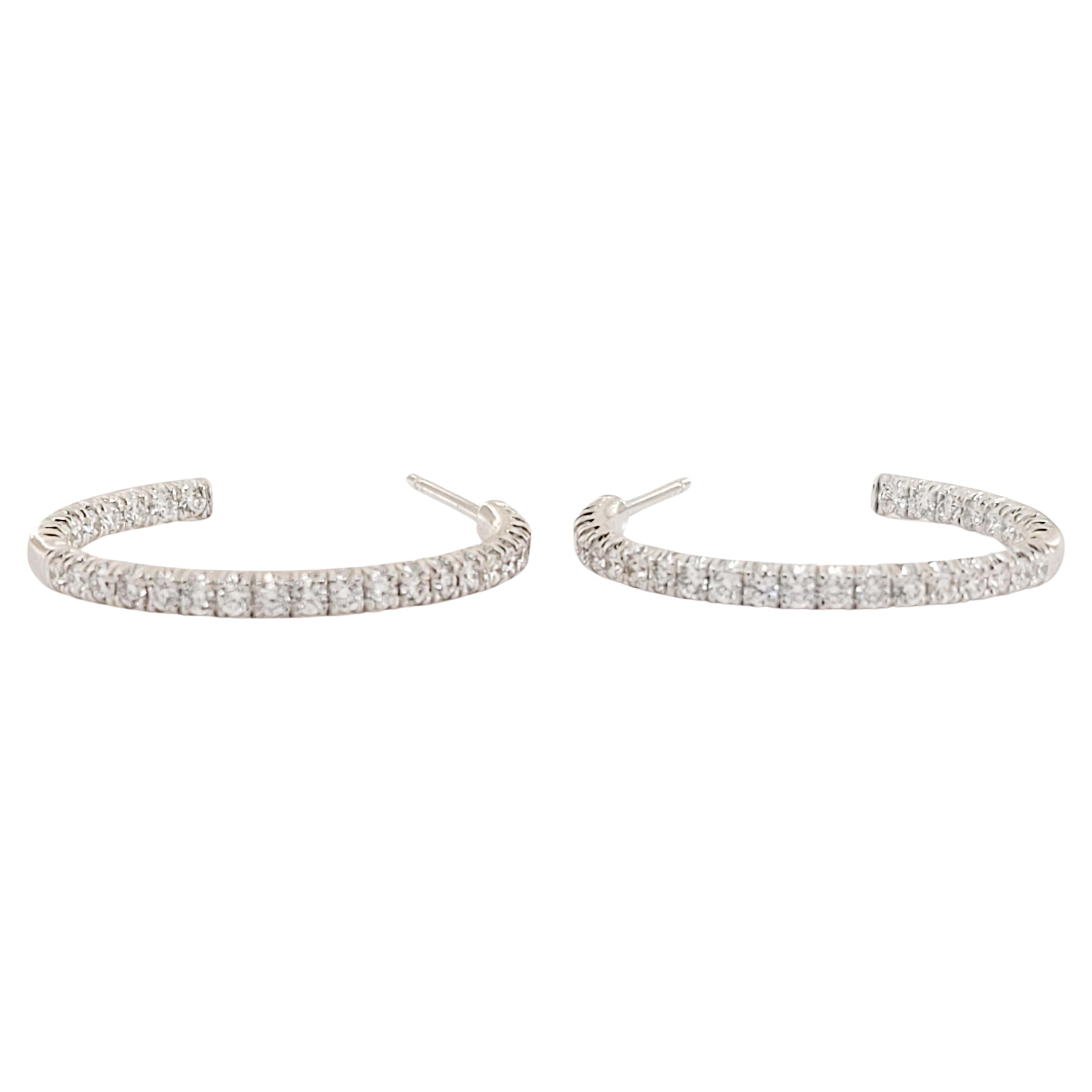Brand Tiffany & co
Condition Never worn
Metro Diamond hoop earrings 
Hoop earrings 22.6mm
18K White Gold
Main stone Diamond
Diamond 0.56cts
Diamond clarity VS
Color Grade G
Weight 3.9gr total
Comes with Tiffany & co earring  box