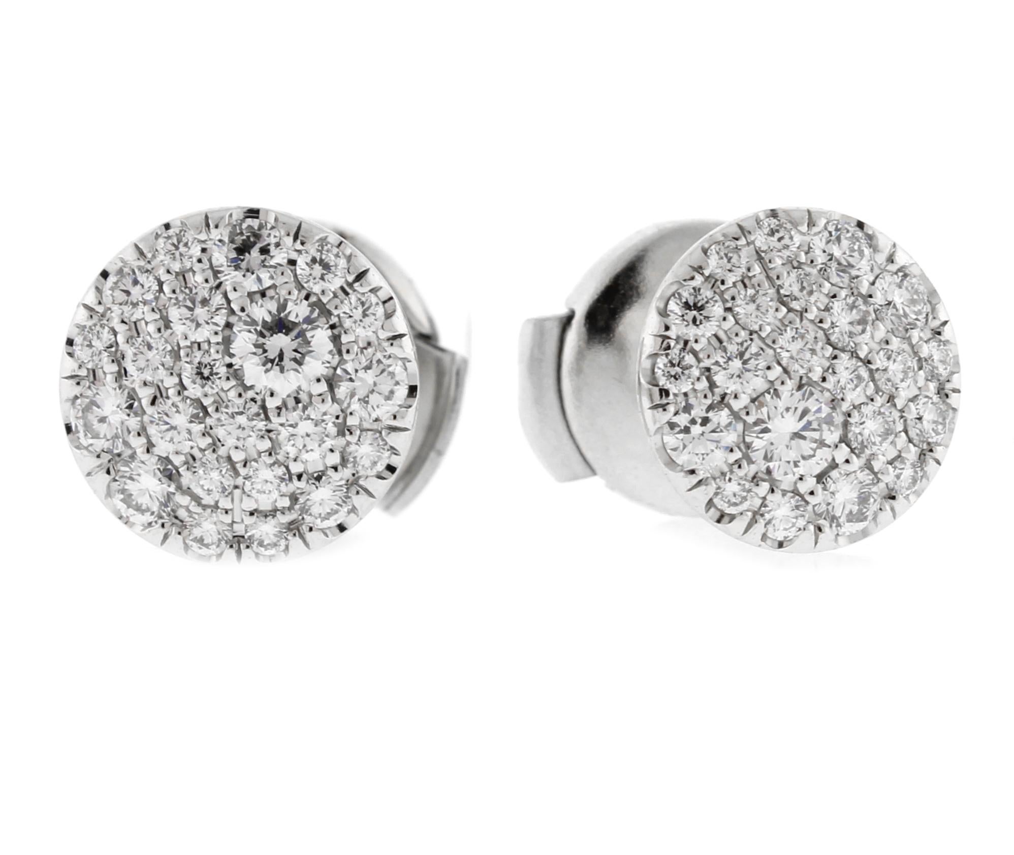 From Tiffany & Co.'s Metro collection, a pair of thier pavé diamond stud earrings
♦ Designer: Tiffany & Co.
♦ Diamonds weigh .37 carats F VS1+
♦ Gem stone: Amethyst 16 X 12
♦  8mm diameter 
♦ Tiffany locking earring back 
♦  Tiffany pouch