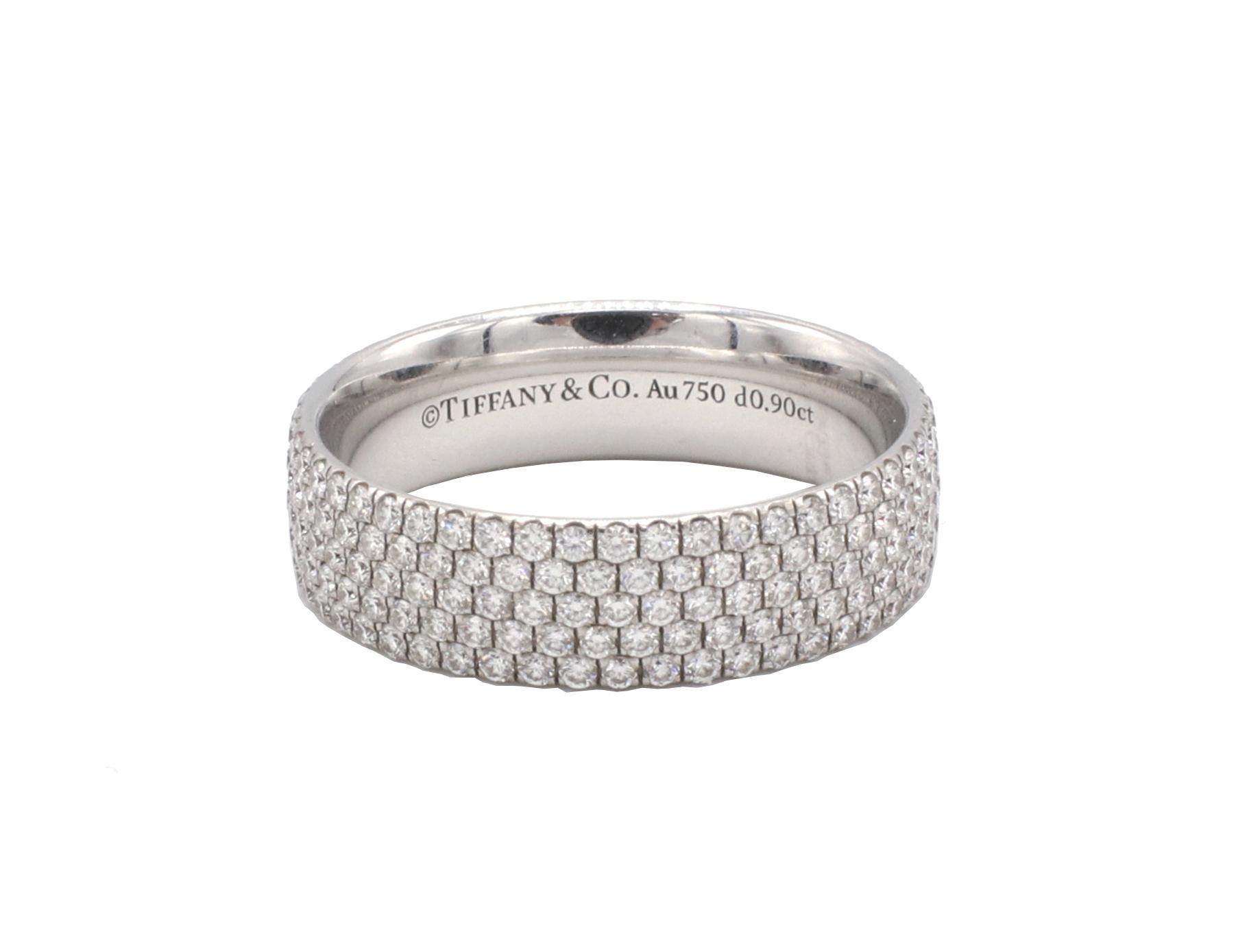 Tiffany & Co. Metro Five-Row Natural Diamond 18 Karat White Gold Band Ring 
Metal: 18k white gold
Weight: 3.87 grams
Diamonds: 0.90 CTW natural round F-G VS round diamonds
Width: 5mm
Size: 6 (US)
Signed: © Tiffany & Co. Au750 d0.90ct
Retail: $9,550