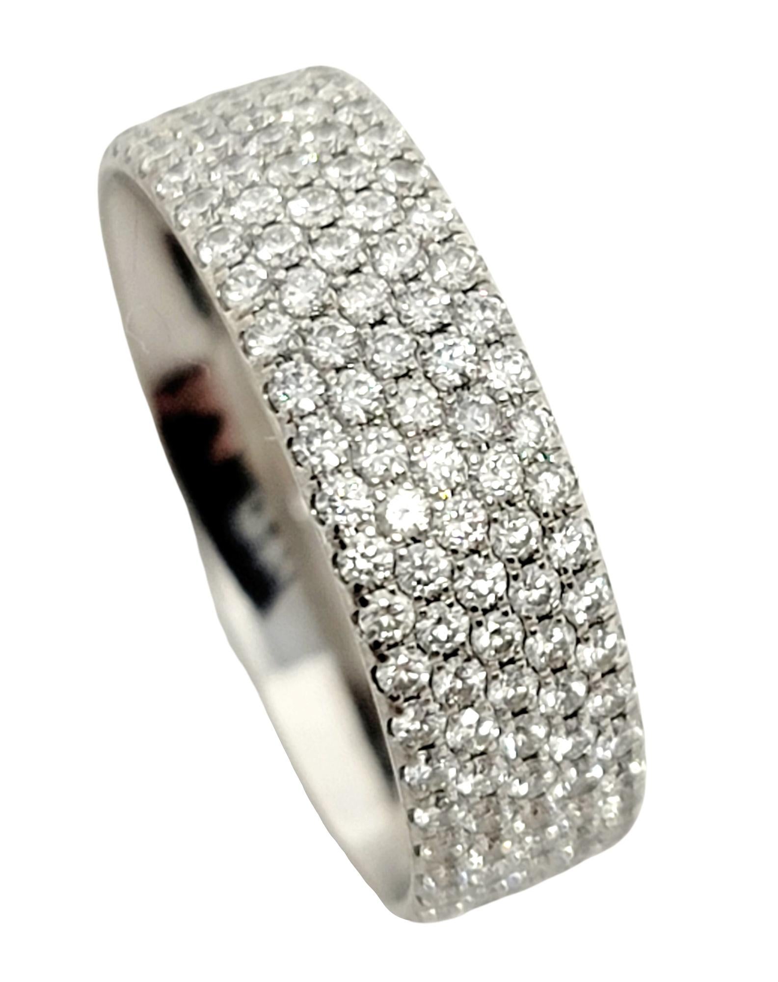 Ring size: 4.5

Sleek and modern diamond eternity band ring from the Tiffany & Co. 'Metro' collection. This gorgeous ring features .85 carats of bright, icy white pave diamonds set in 5 rows in a highly polished 18 karat white gold setting. The