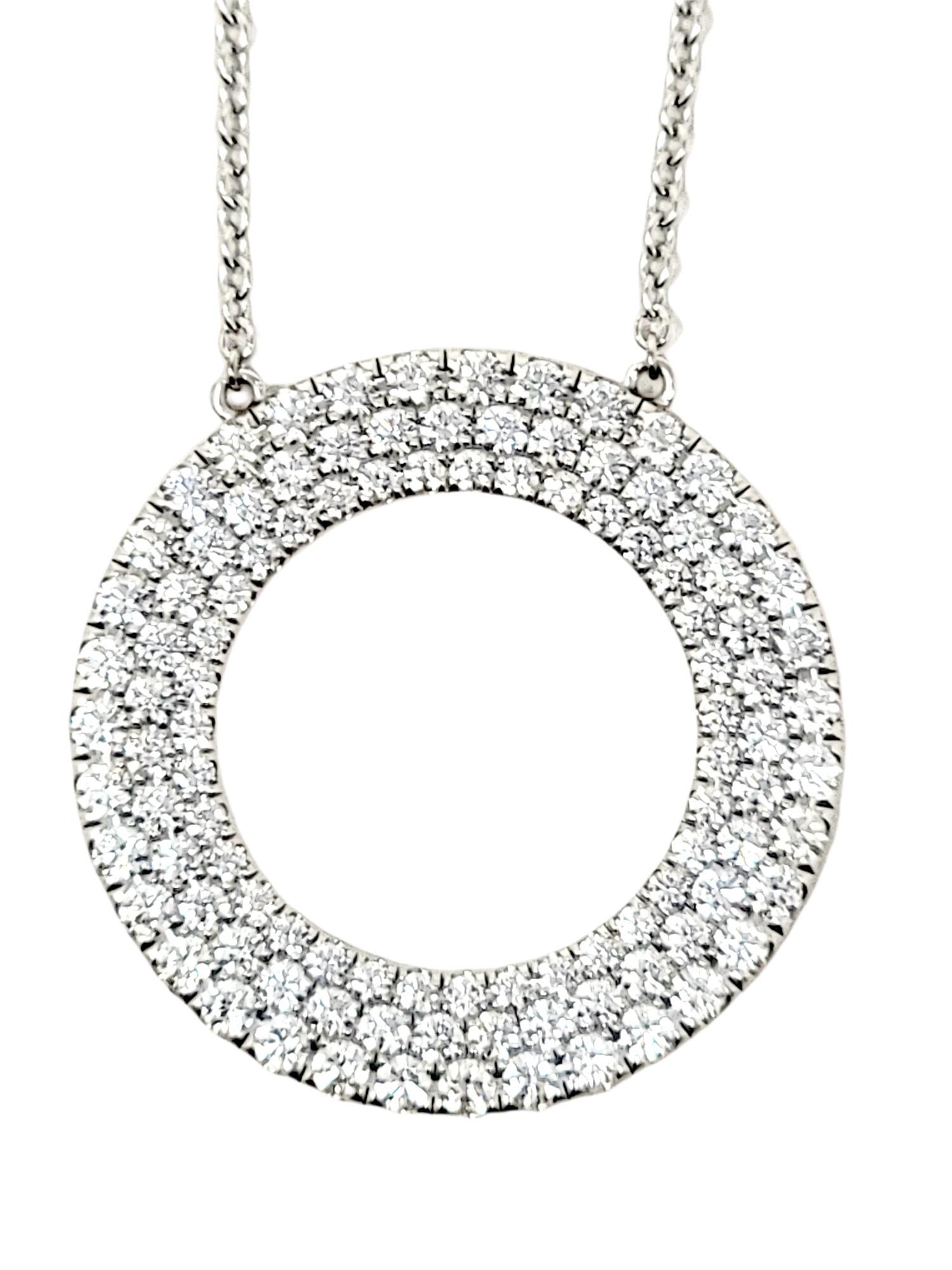 Gorgeous glittering diamond pendant necklace by Tiffany & Co. is the epitome of minimalist elegance. The Tiffany 'Metro' piece combines delicate, feminine features with a timeless design, making this a piece that you will wear time and time again. 