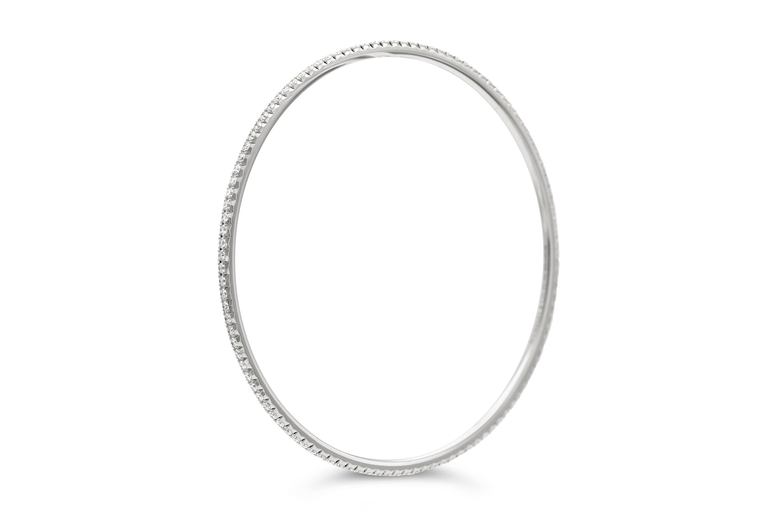 Finely crafted in 18K white gold with 1.65 Carats of Round Brilliant cut Diamonds.
Signed by Tiffany & Co.
Made in Belgium
7 3/4 inches