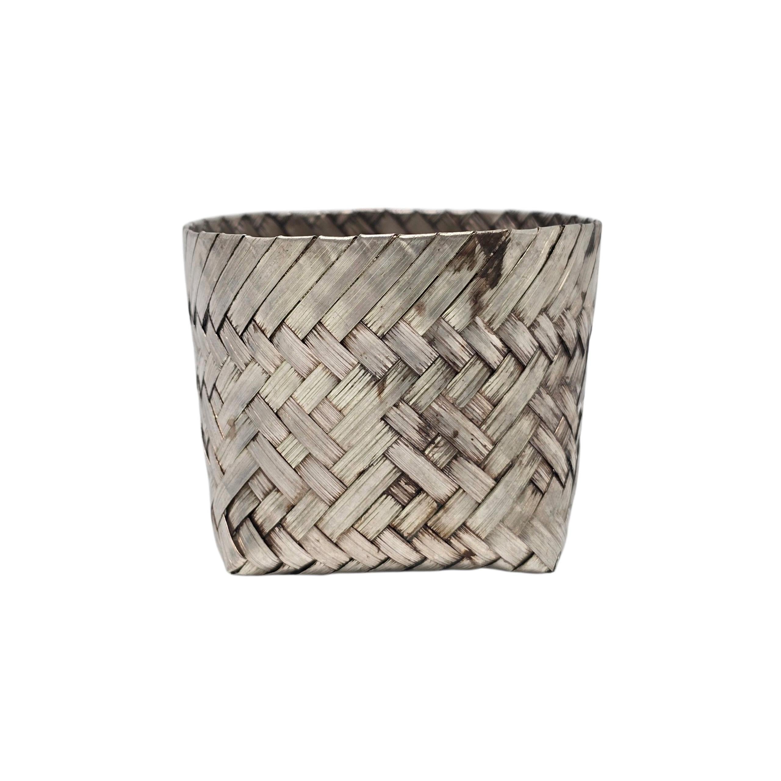 Tiffany & Co Mexico sterling silver small woven basket.

A small basket featuring a herringbone woven design with a round opening and a square base. Tiffany & Co box and pouch are not included.

Measures approx 44.8g, 28.8dwt.

Opening measures