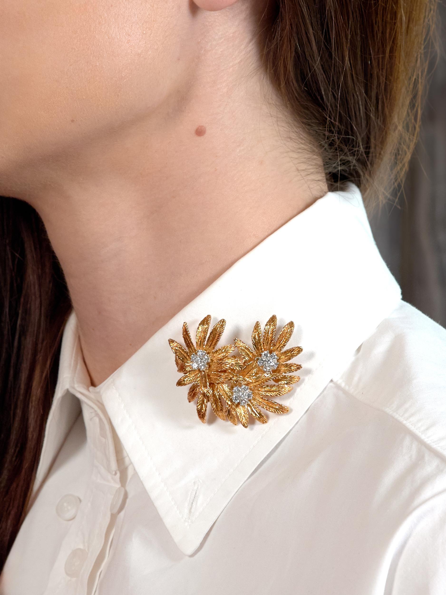 Designed as three dimensional flowers with furling yellow gold petals with engraved texture
Centering clusters of transitional cut diamonds prong set in white gold
Weighing approximately 1.53 carats - G color with VS2 clarity
Completed by a hinged