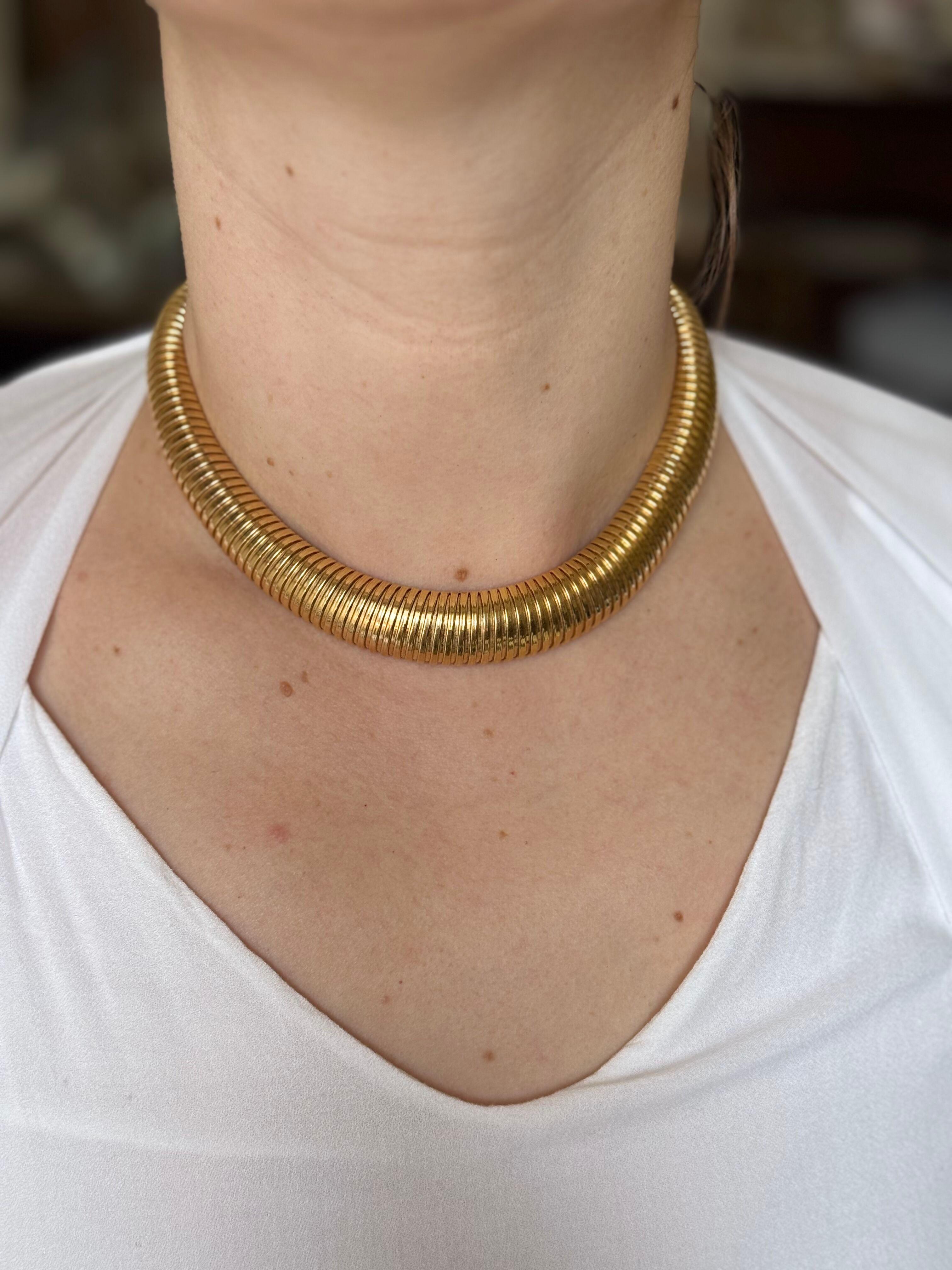 18k yellow gold tubogas style necklace by Tiffany & Co, circa 1950s.
Necklace has a slight flexible construction - length 16