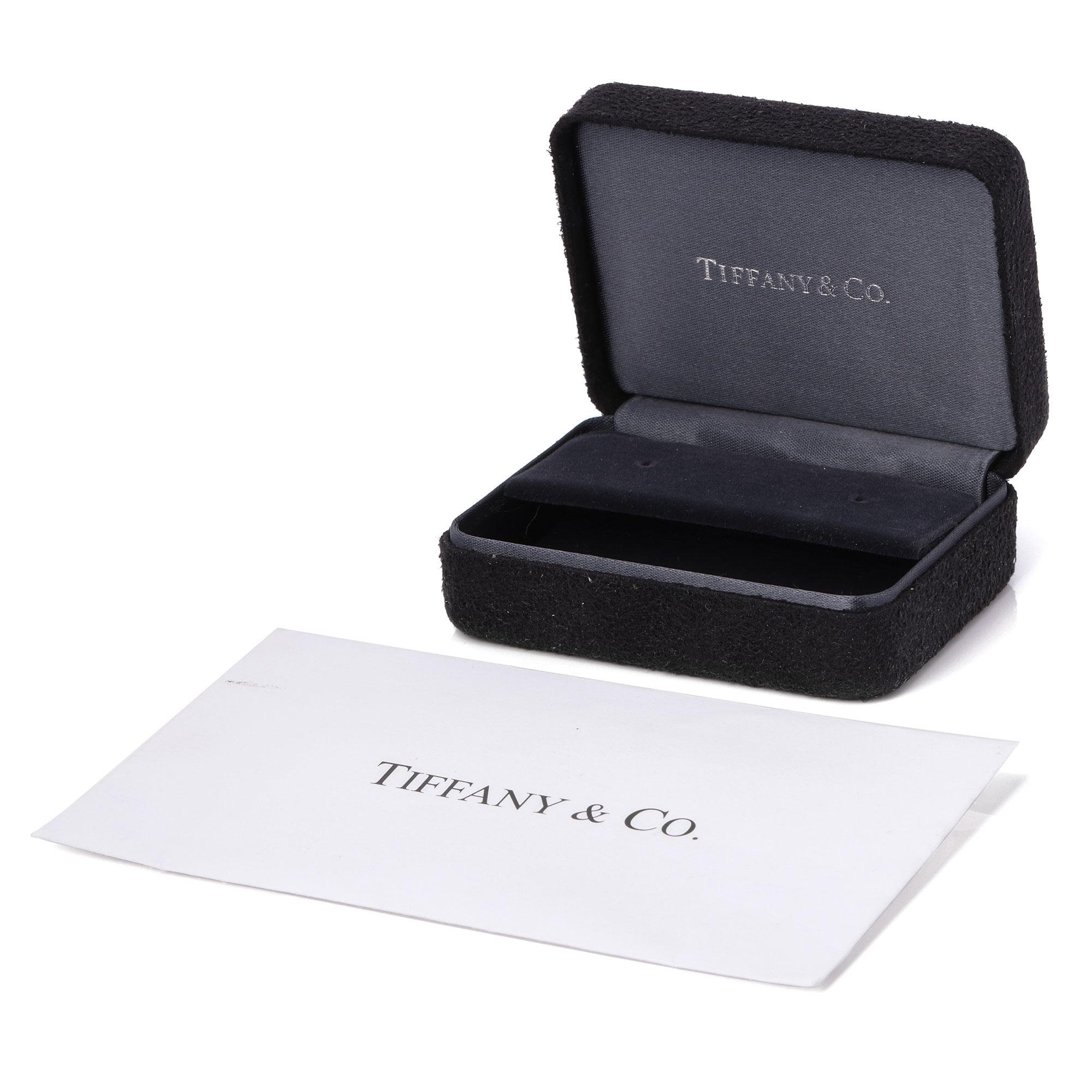 These mini stud earrings by Tiffany & Co are from their Victoria collection and are inspired by the fire and radiance of superlative diamonds. They feature 8 marquis cut diamonds totalling 0.19ct, colour F/G, clarity VS made in platinum. Accompanied