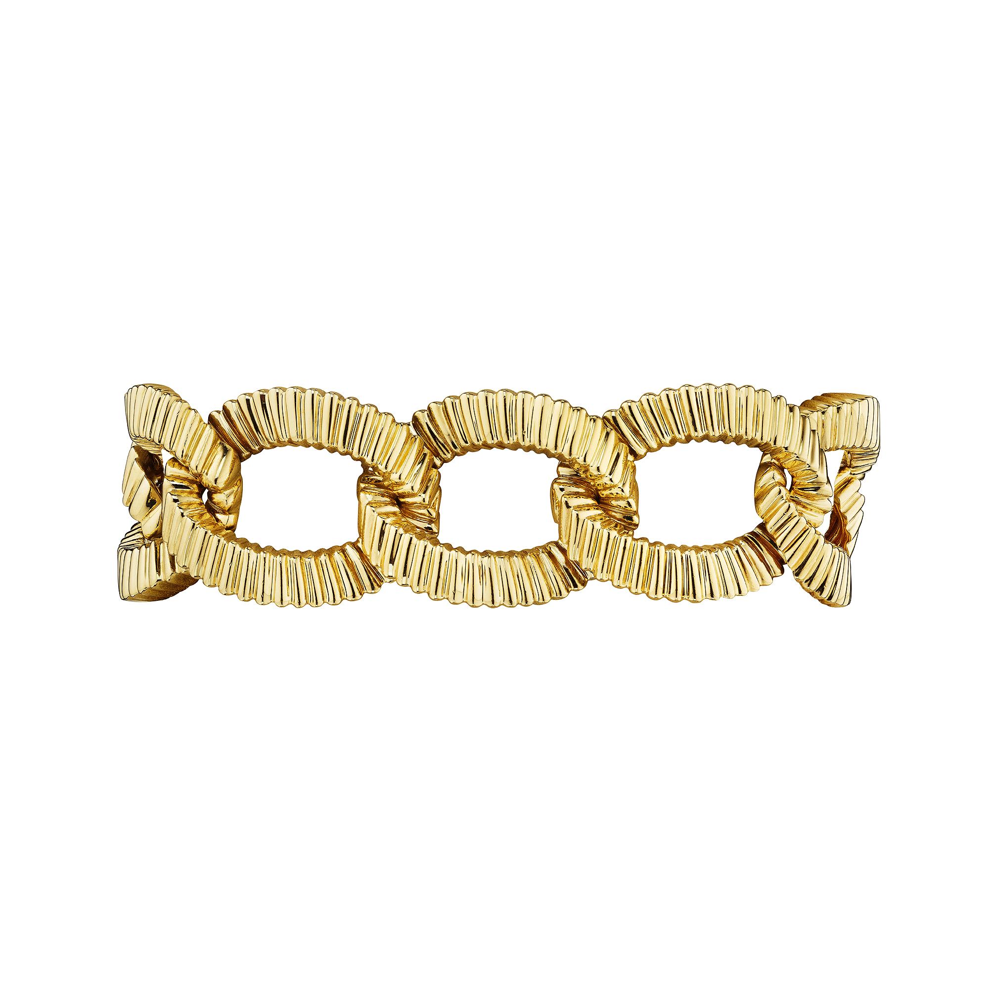 With a powerful spirit, this highly polished 18 karat yellow gold Tiffany & Co. modernist textured link bracelet sensually moves with verve.  Signed Tiffany & Co. 1998.  Circa 1998.  7 1/2