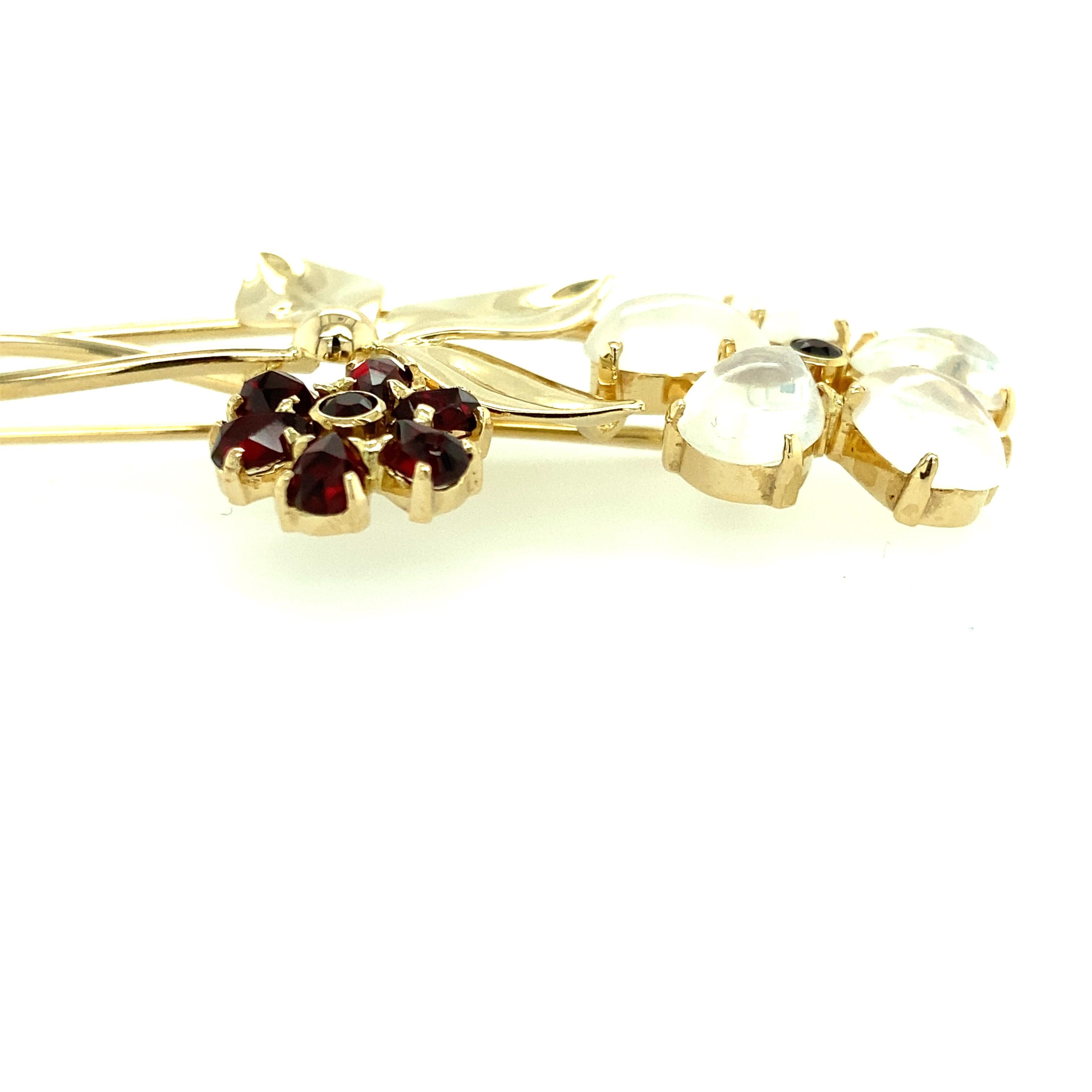 Tiffany & Co. Moonstone and Garnet Flower Pin. 1940s. In Good Condition For Sale In Towson, MD