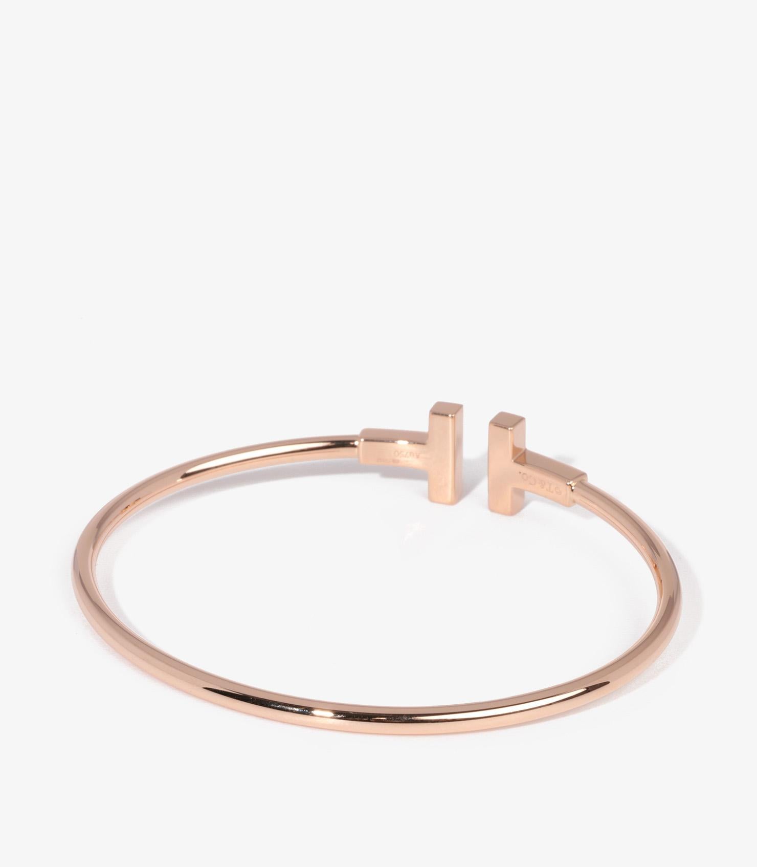 Tiffany & Co. Mutter der Perle 18ct Rose Gold Tiffany T Draht-Armband

Marke - Tiffany & Co.
Modell- Tiffany T Drahtarmband
Produkttyp- Armband
Begleitet von - Tiffany & Co. Box, Quittung
MATERIAL(e)- 18ct Rose Gold
Edelstein-Perle

Edelstein