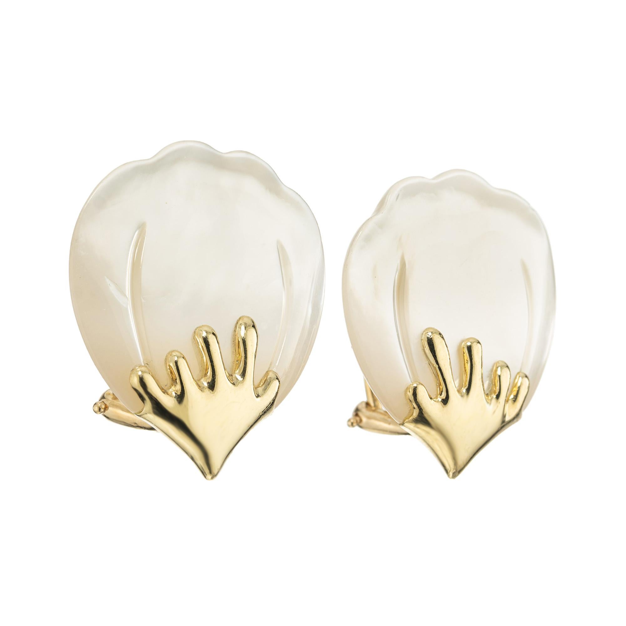 Iconic Tiffany & Co. Hong Kong mother of pearl 18k yellow gold clip post earrings. 2 beautiful rose petal carved mother of pearl set in 18k yellow gold clip post settings which are stamped Tiffany & Co. Hong Kong. The radiant yellow gold beautifully