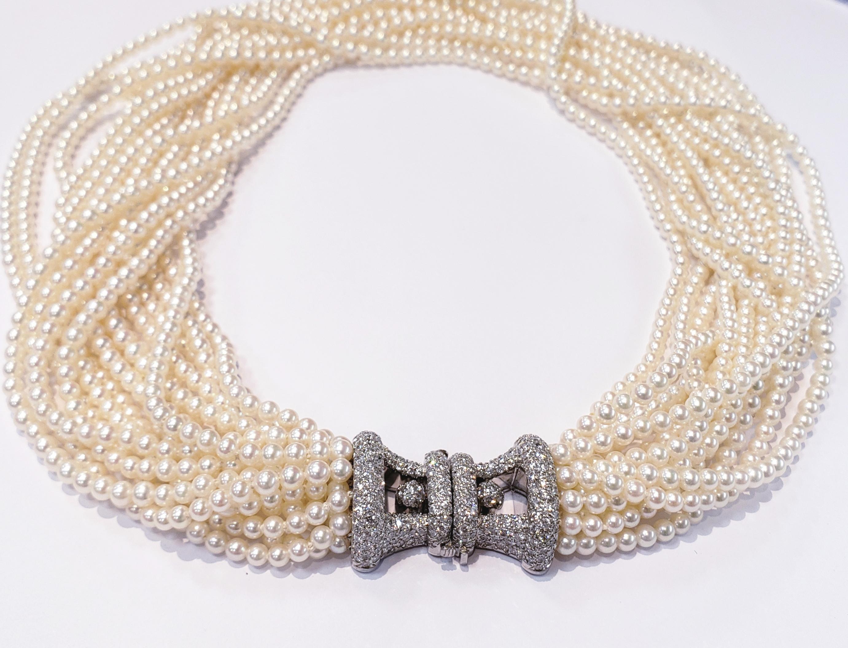 This Makes An Elegant Statement !  A Multi 16 Strand Pearl Choker Necklace, With A Gorgeous Pave Set Diamond Clasp, Set In Platinum. Clasp has An Open Design, And Can Be Worn In Front, On Side, Or In Back. Pearls can Be worn Loose Or Twisted For