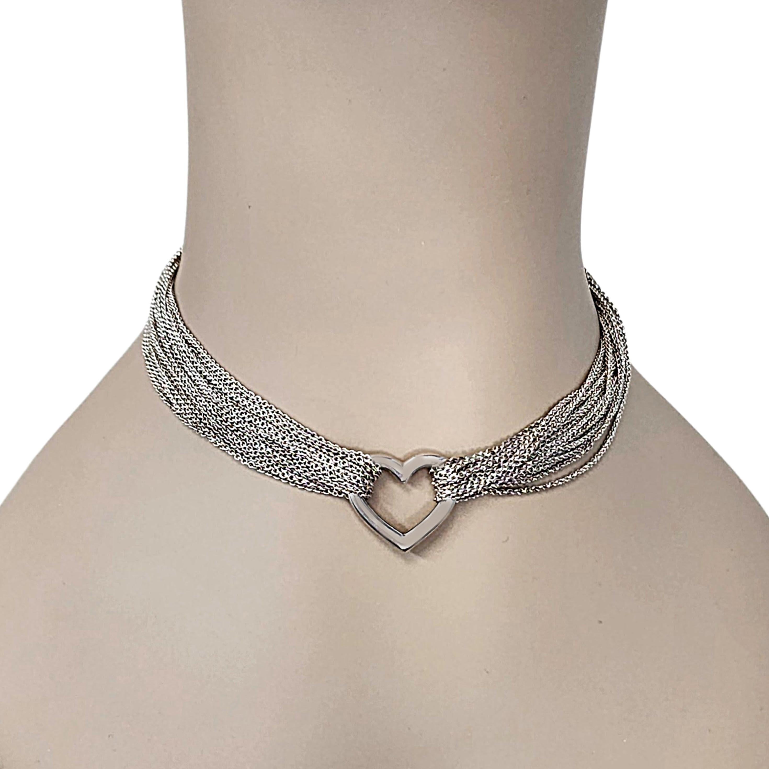 Tiffany & Co sterling silver open heart multi-strand necklace with toggle closure, with box and pouch.

This lovely open heart necklace by Tiffany & Co features multi strand chains with a classic toggle closure. Includes Tiffany & Co box and