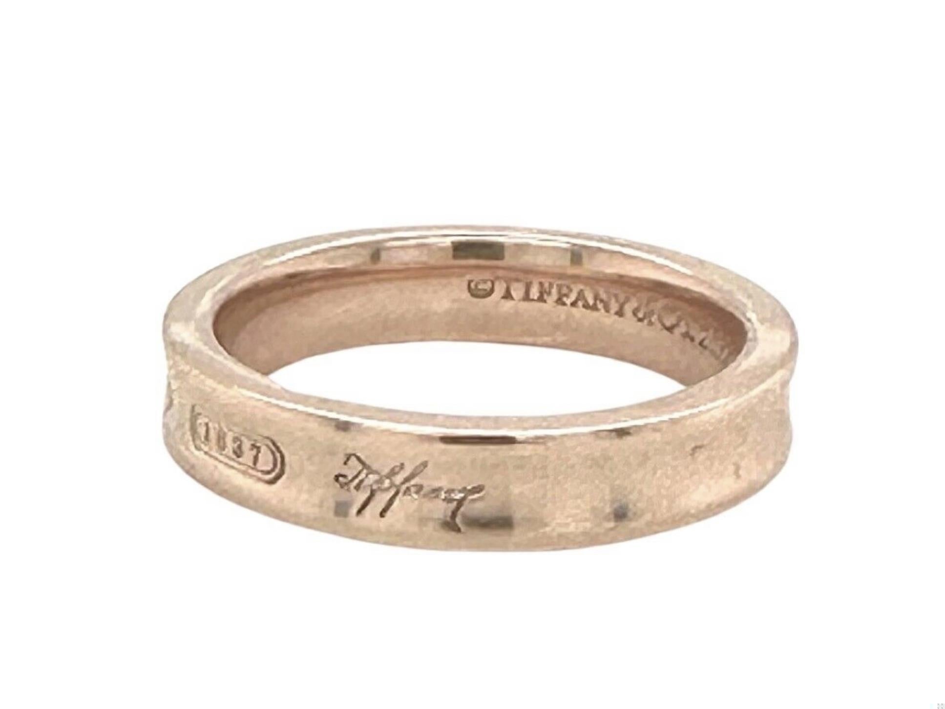 This Tiffany & Co Rubedo Ring from the 1837 Collection is the perfect way to show off your wealth in a humble way. This fashionable ring looks great and is the perfect addition to any jewelry collection. With its sleek design and timeless feel,