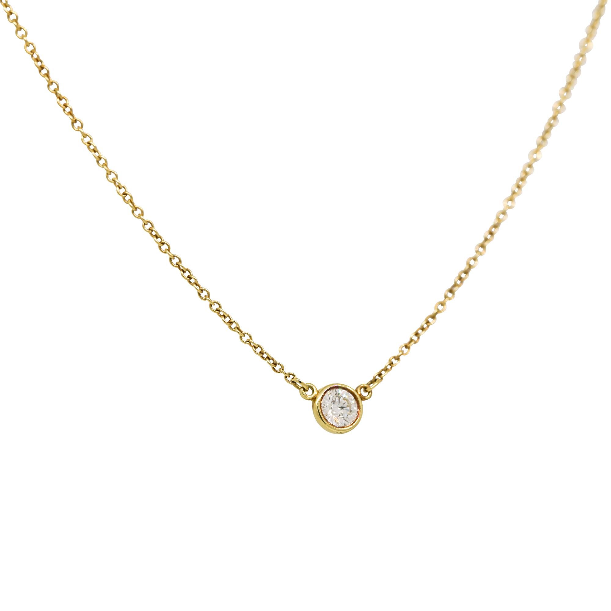 Tiffany & Co. 18k Yellow Gold Natural 0.17 Carat Diamond Floating Necklace

This exquisite Tiffany & Co. floating diamond necklace perfectly blends timeless elegance and modern style. Crafted from 18k yellow gold, this necklace features a sleek and
