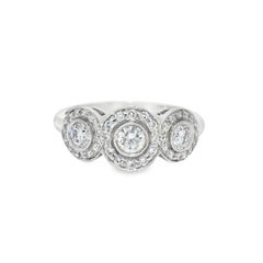 Tiffany & Co. Natural 0.55 Carat Diamond Halo 3 Circle Platinum Ring En Stock