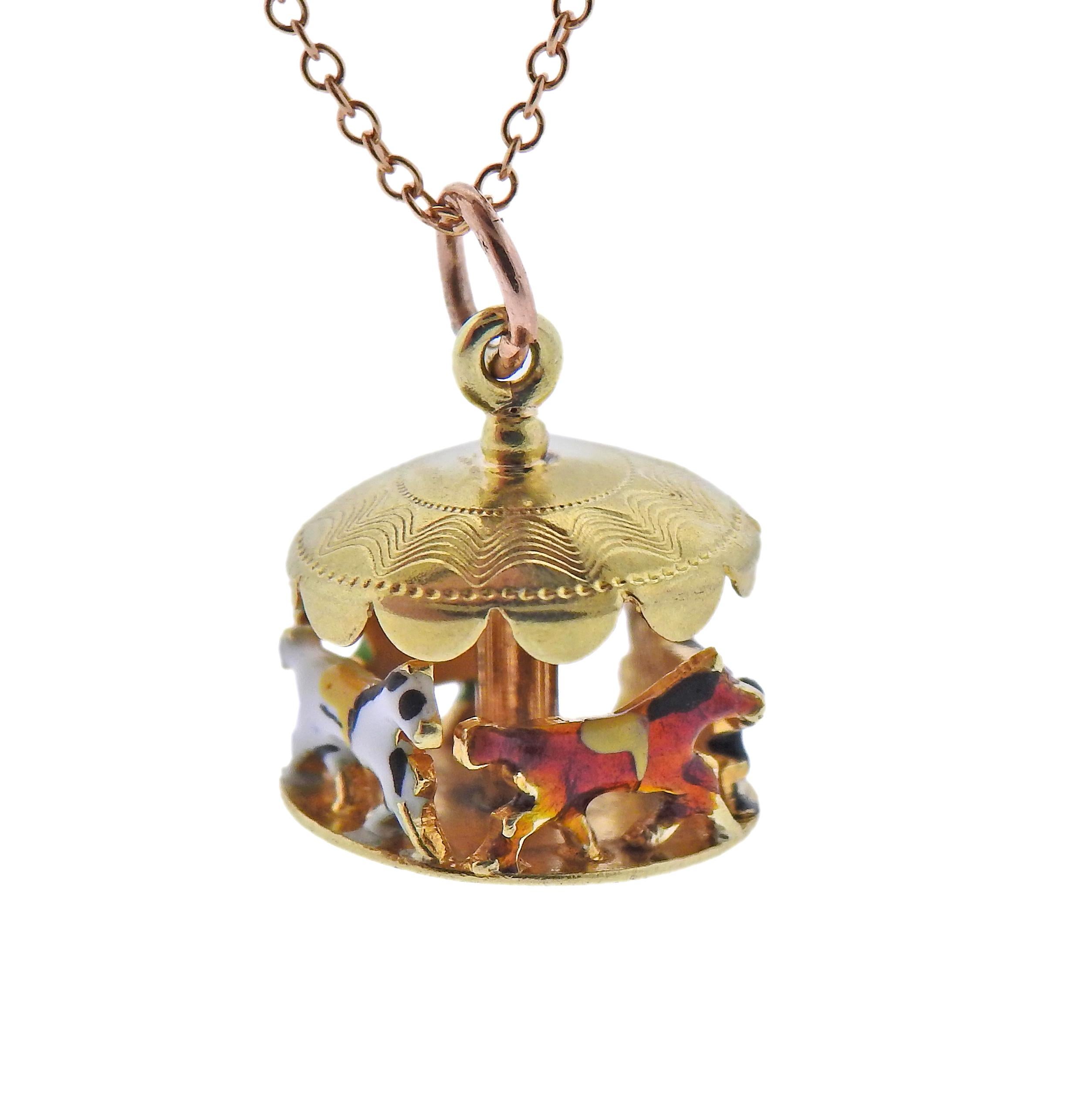 18k yellow gold Tiffany & Co chain necklace, with a 14k gold enamel decorated carousel charm. Necklace is 16