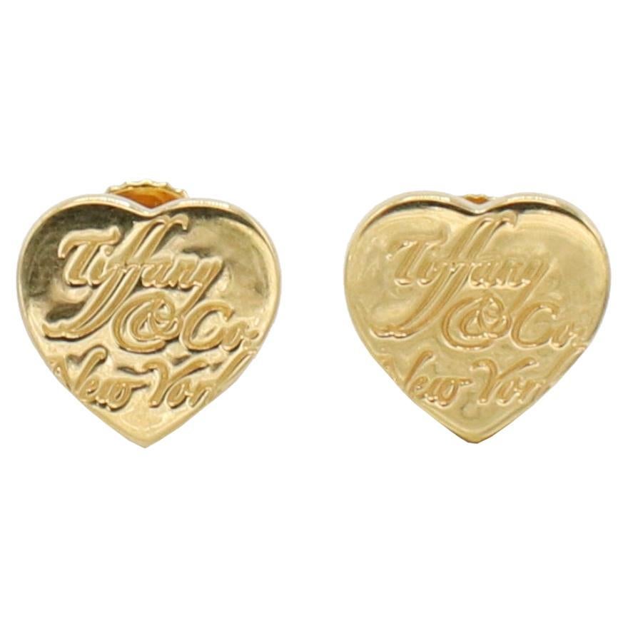 Tiffany & Co. New York Notes 18 Karat Yellow Gold Heart Logo Stud Earrings For Sale