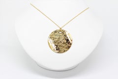 Tiffany & Co. Notes 18 Carat Yellow Gold Round Pendant Necklace